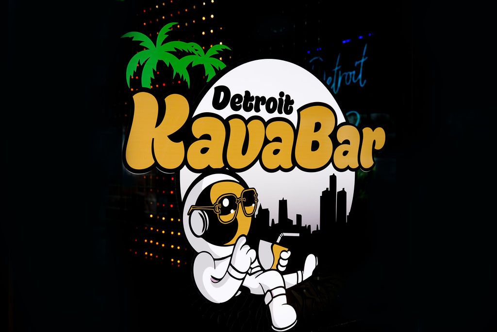 Detroit Kava Bar logo with palm trees, white moon, and an astronaut lounging on a black background