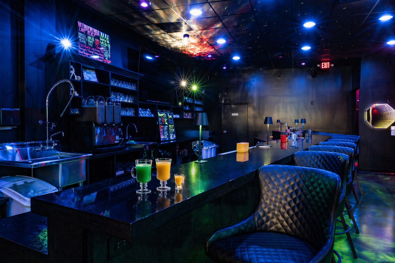 Dim neon-lit lounge with black booths, glass tables, and colorful drinks on a dark ceiling-lit interior