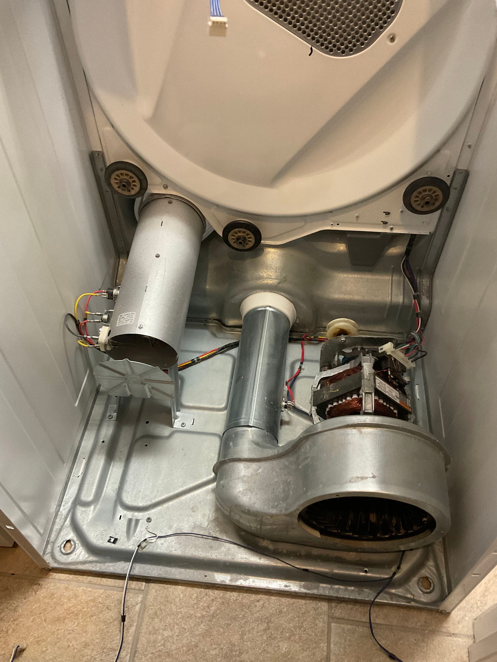 The inside of a washer and dryer is shown.