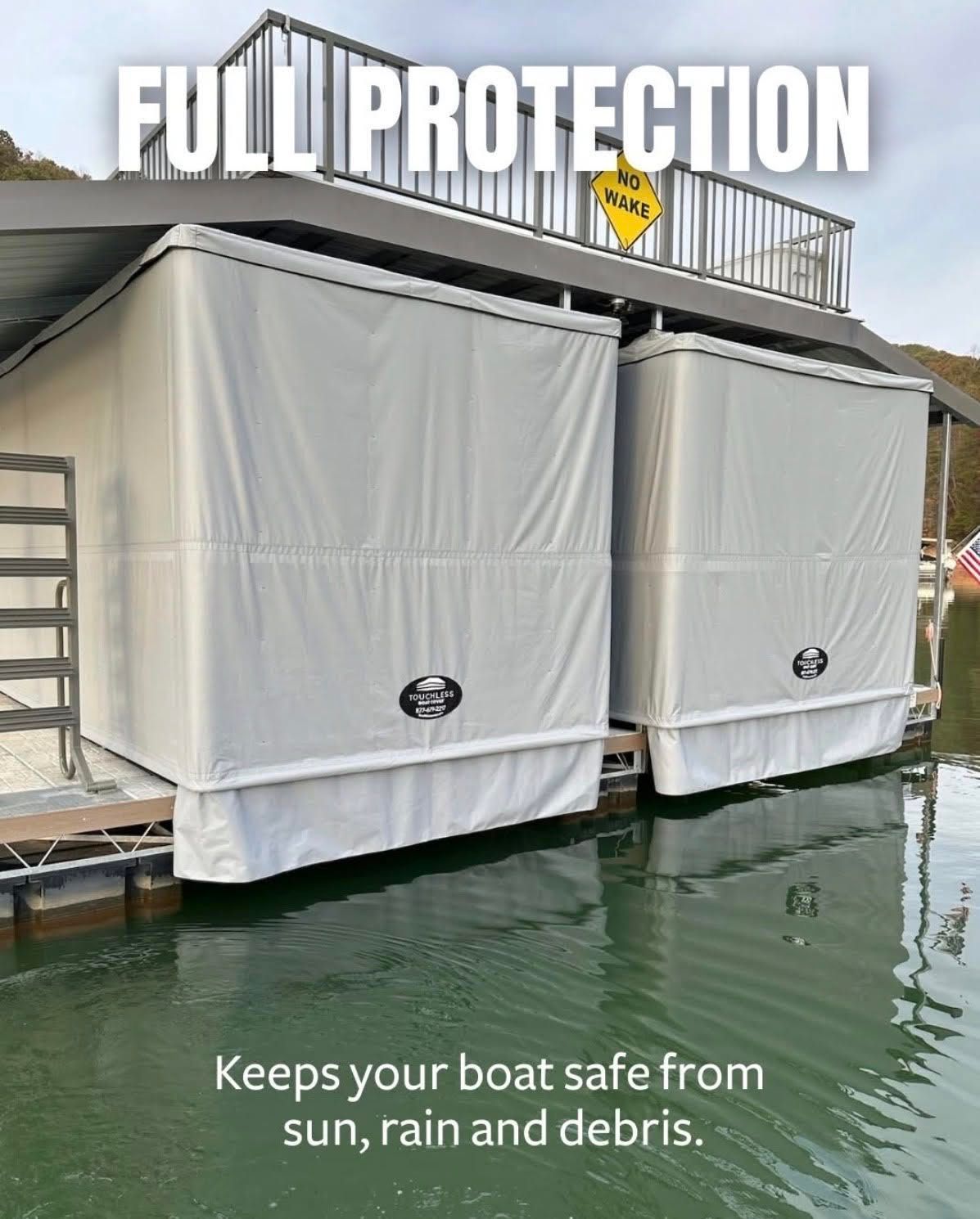Two gray boat dock curtains labeled Full Protection on a dock over green water.
