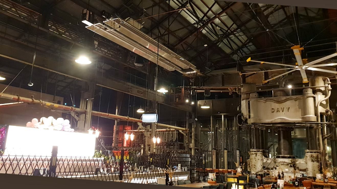A Large Room With a Lot of Lights and a Ceiling Fan — Accurate Fitout Solutions In Parramatta, NSW