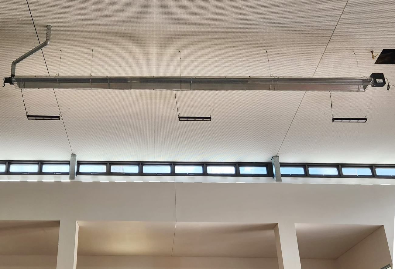 The Ceiling of a Building With a Drain Pipe Hanging From It — Accurate Fitout Solutions In Wetherill Park, NSW