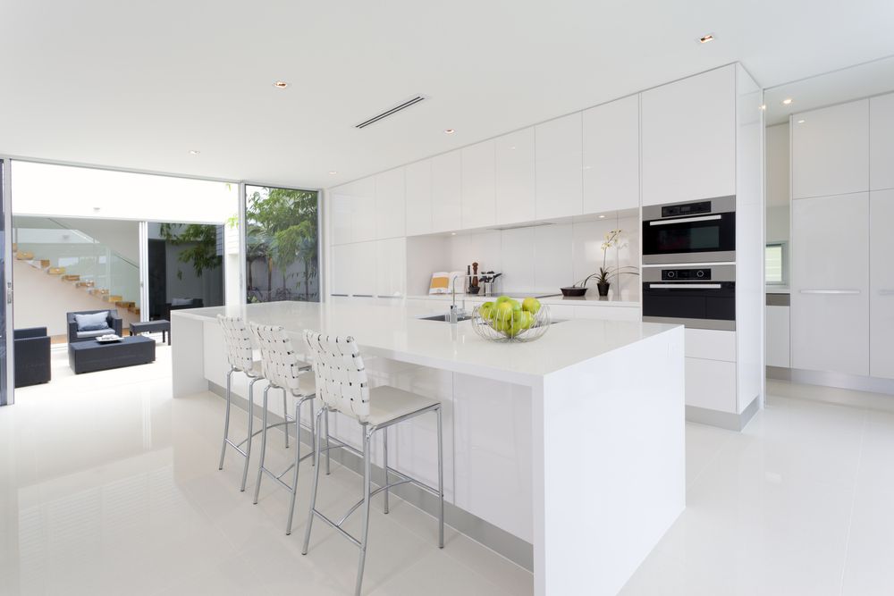 Kitchen With Island and Open Patio Doors — The Right Kitchen Company In Thirroul, NSW