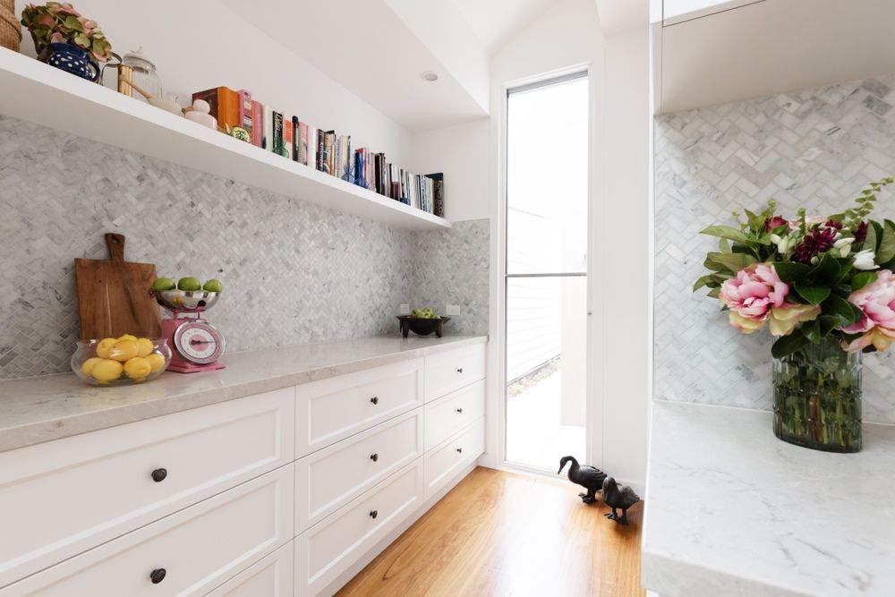 Bright White Kitchen Hallway With Built-in Cabinets — The Right Kitchen Company in Shellharbour, NSW