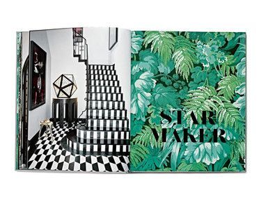 A book is open to a page with a black and white checkered floor and stairs.