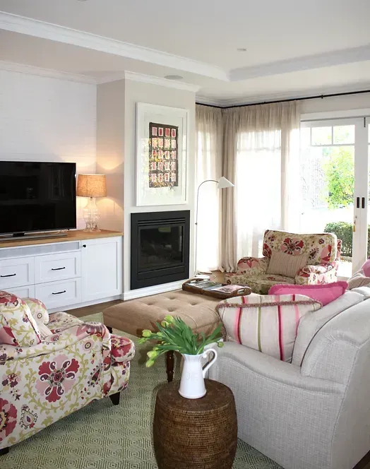 A living room filled with furniture and a flat screen tv