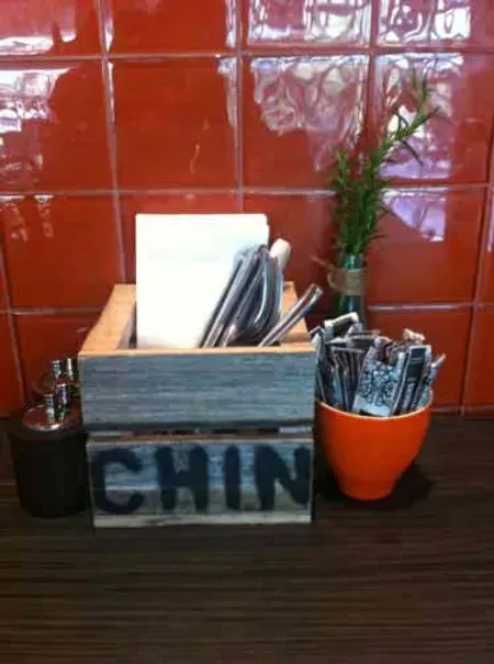 A wooden box with the word chin on it