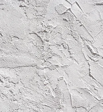 A close up of a white concrete wall texture.
