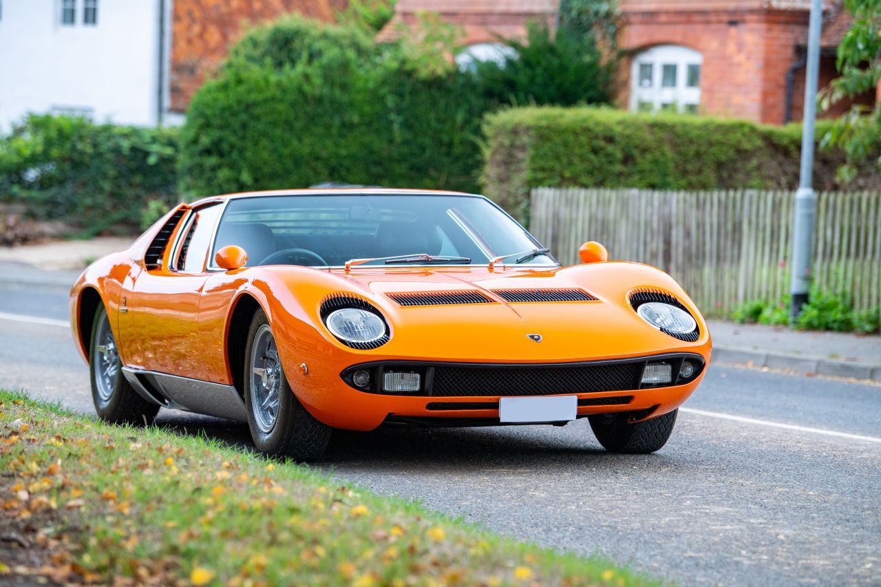 Lamborghini Miura full interior retrim black leather orange upholstery classic restoration stitching