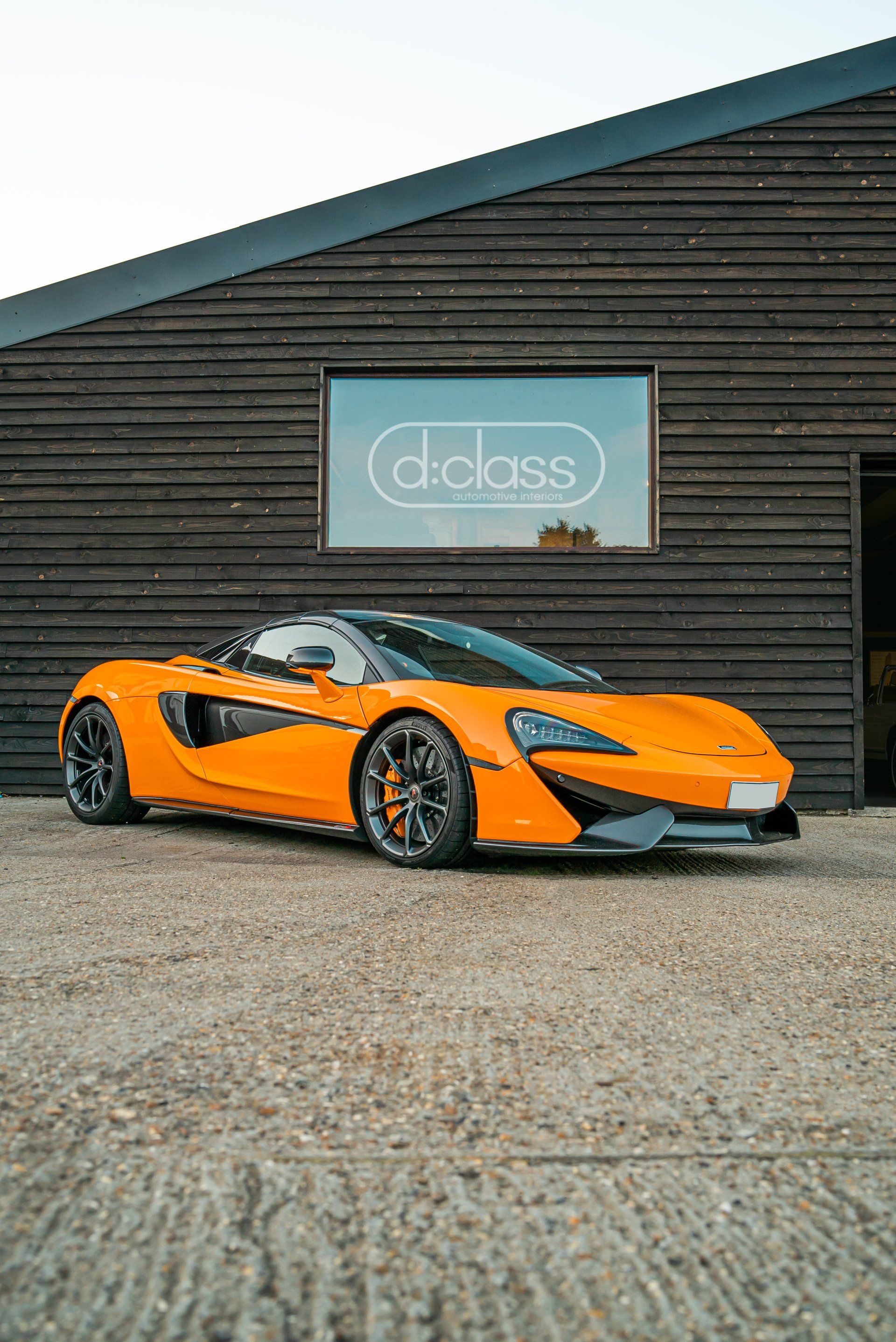 Mclaren 570s wheel retrim Alcantara leather stitch stitching orange black