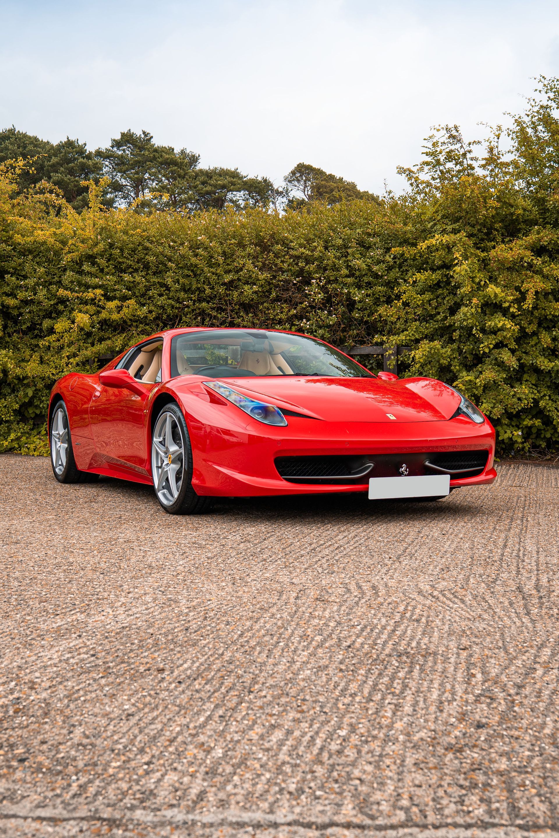 Ferrari 458 Spider steering wheel retrim d:class leather debossed perforated upholstered oem brand new black red