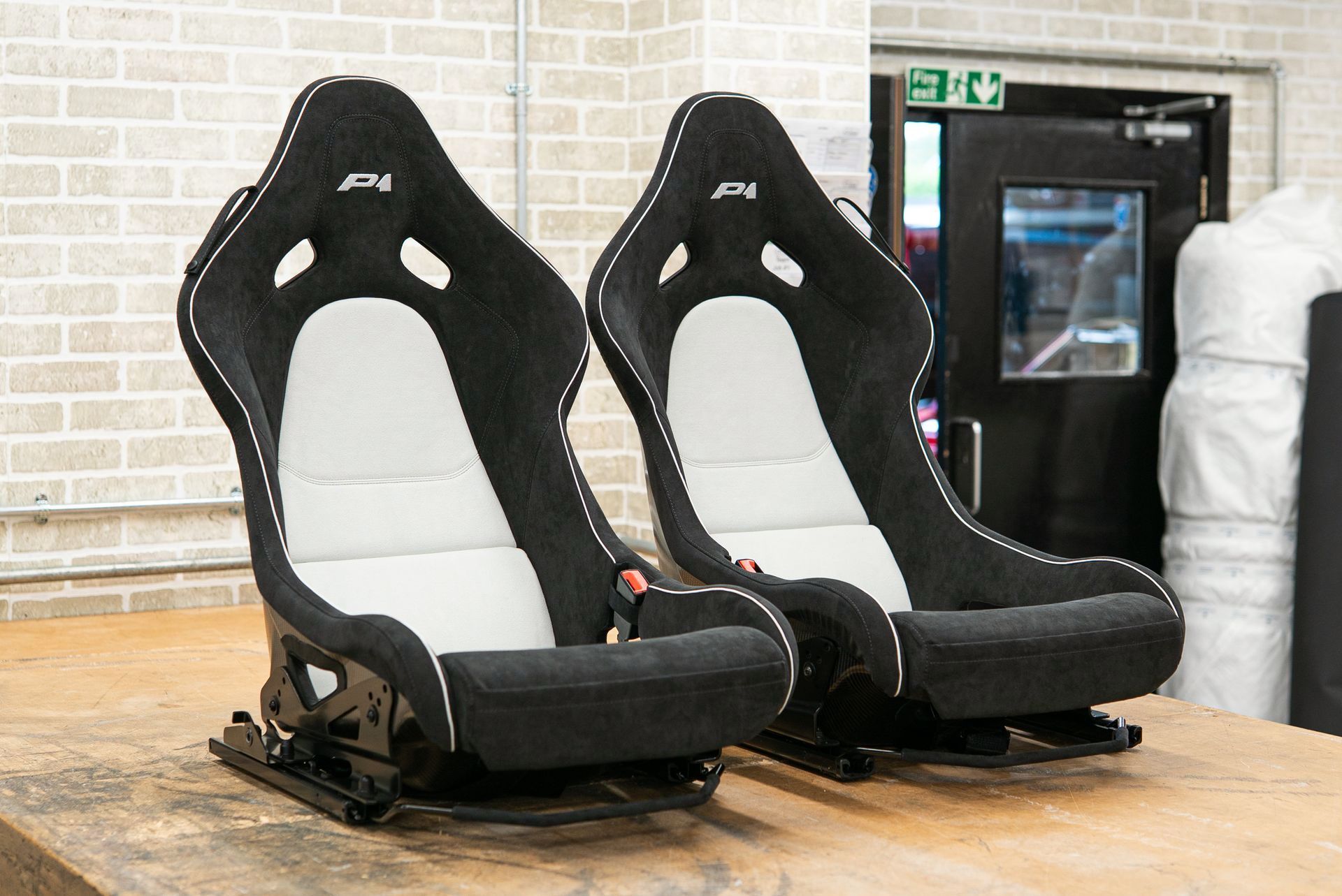 mclaren p1 seats retrim retrimmed trim trimmed alcantara logo embroidery black white micro piping micro-piping interior dclass d:class near me vehicle
