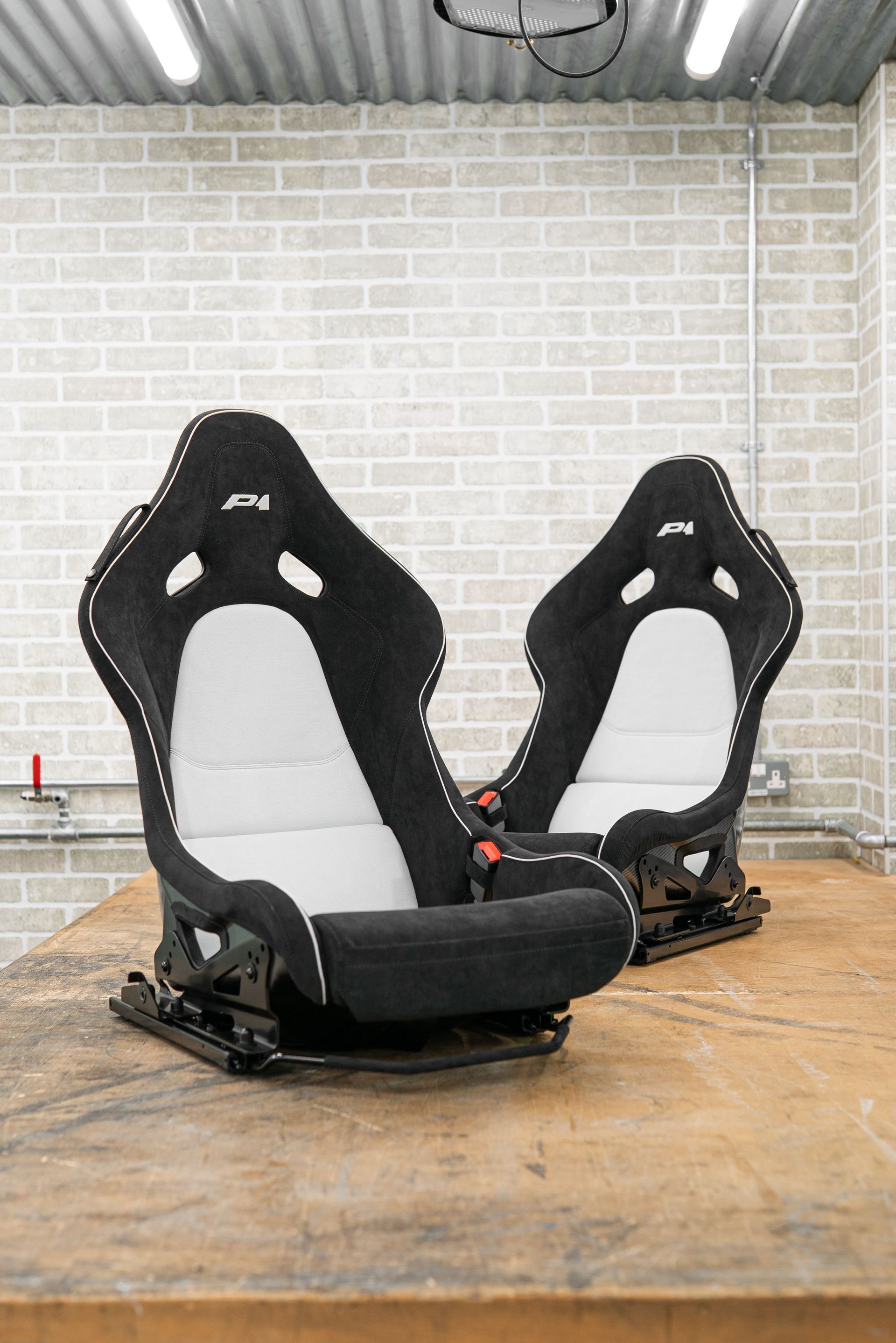 mclaren p1 seat seats retrim alcantara embroidery embroidered black grey white alcantara interior trim trimmed retrimmed resotration oem d:class dclass tourer touring conversion