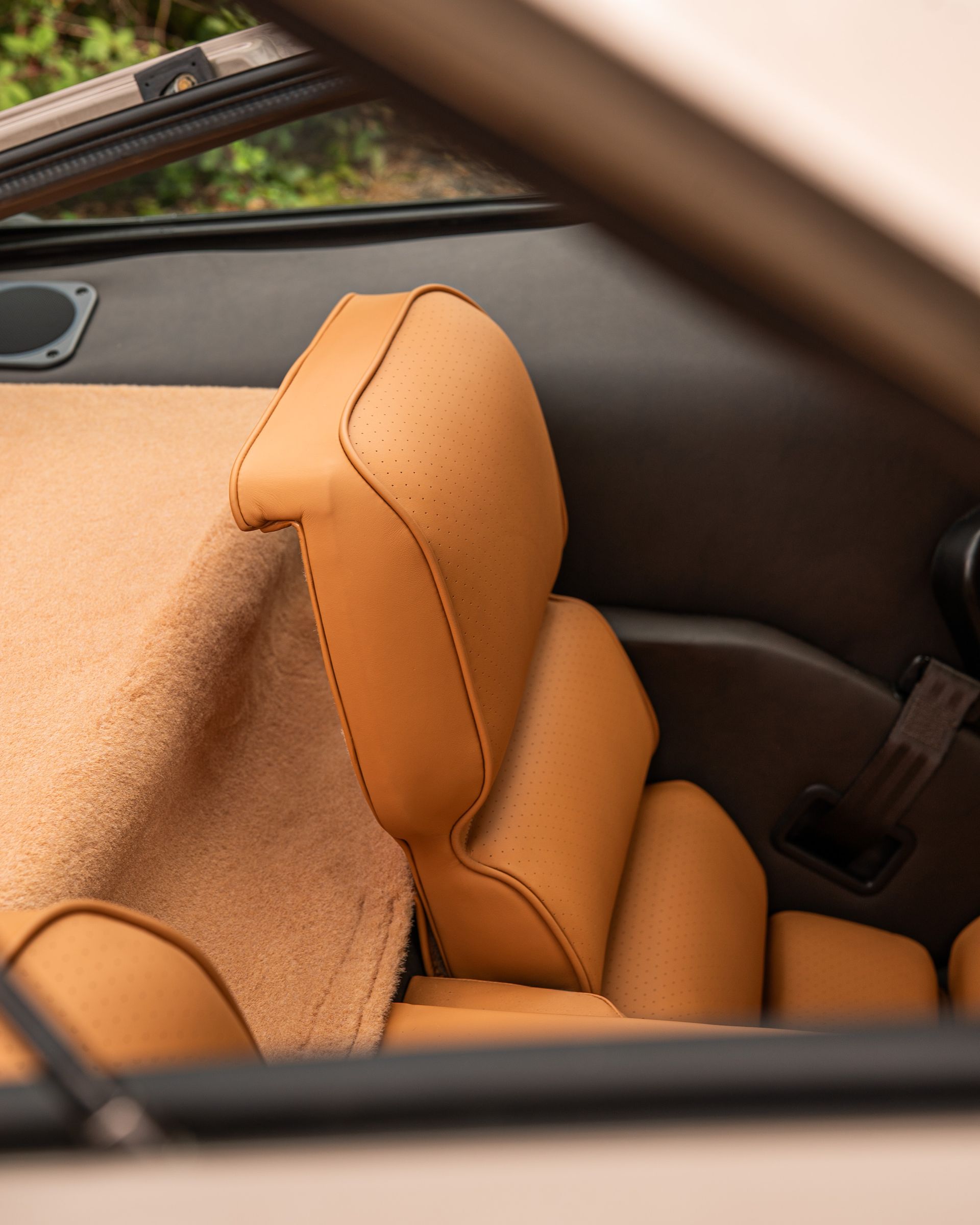 porsche 928 interior retrim leather brown tan cream restomod upholstery reupholstered singer dclass d:class restoration respray