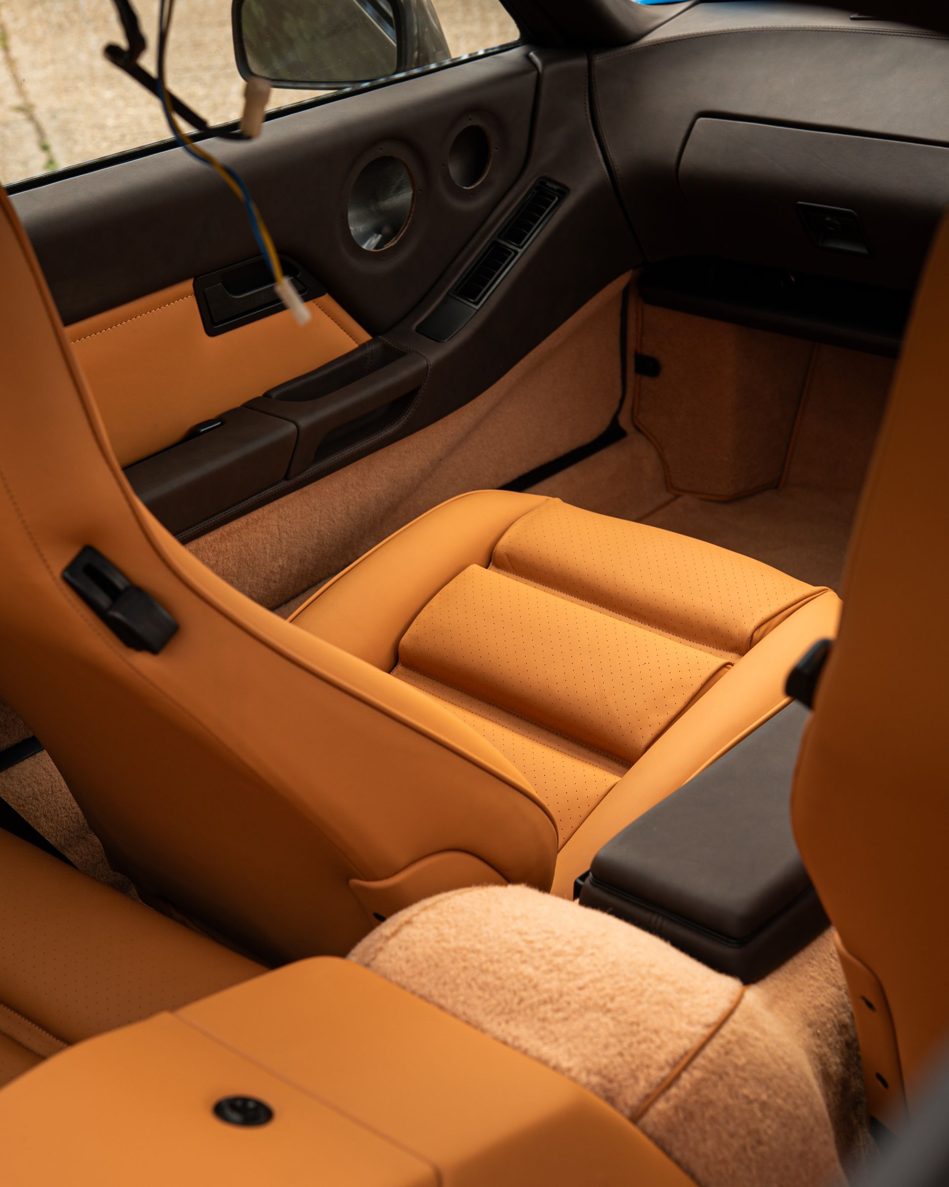 porsche 928 interior retrim leather brown tan cream restomod upholstery reupholstered singer dclass d:class restoration respray