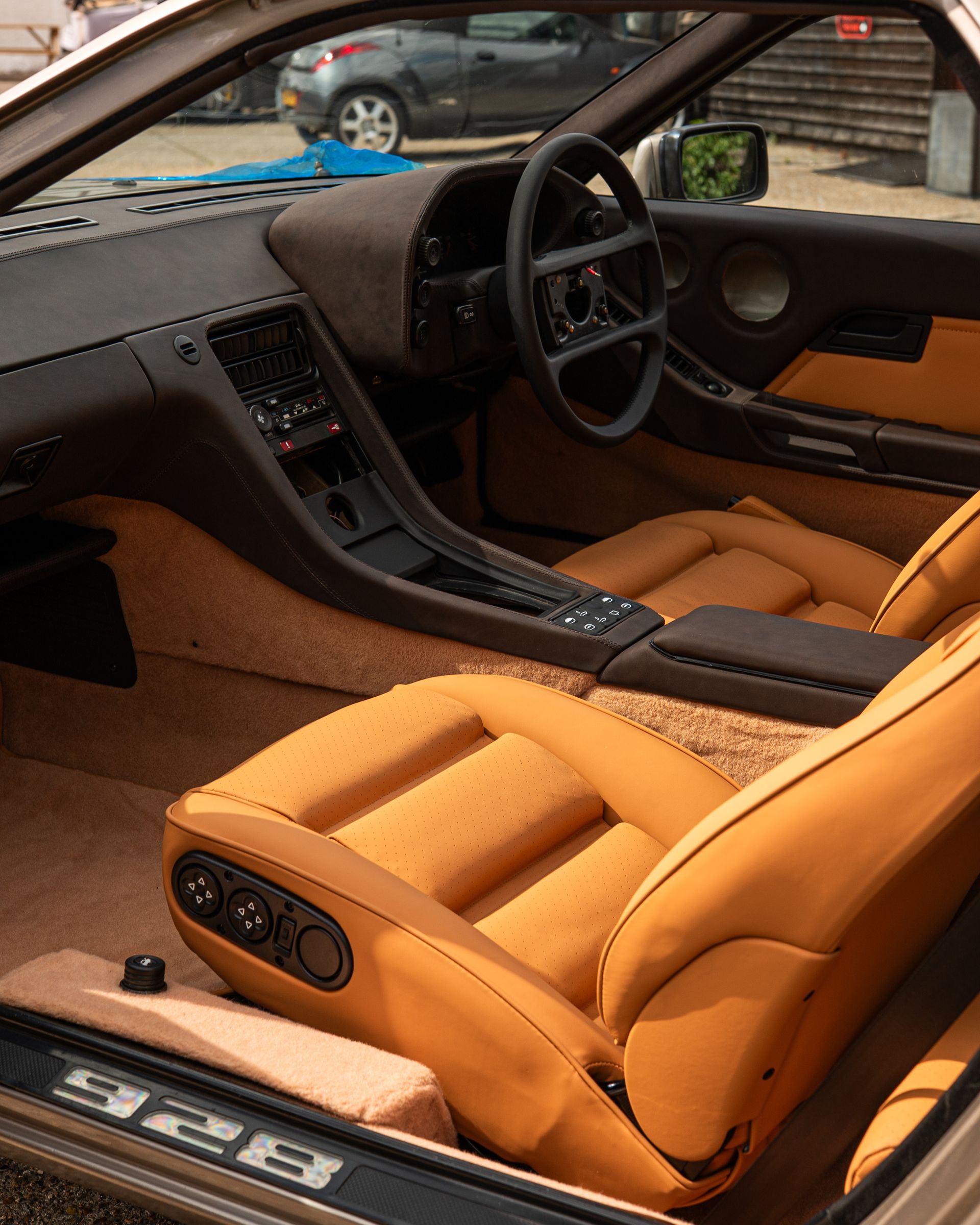 porsche 928 interior retrim leather brown tan cream restomod upholstery reupholstered singer dclass d:class restoration respray