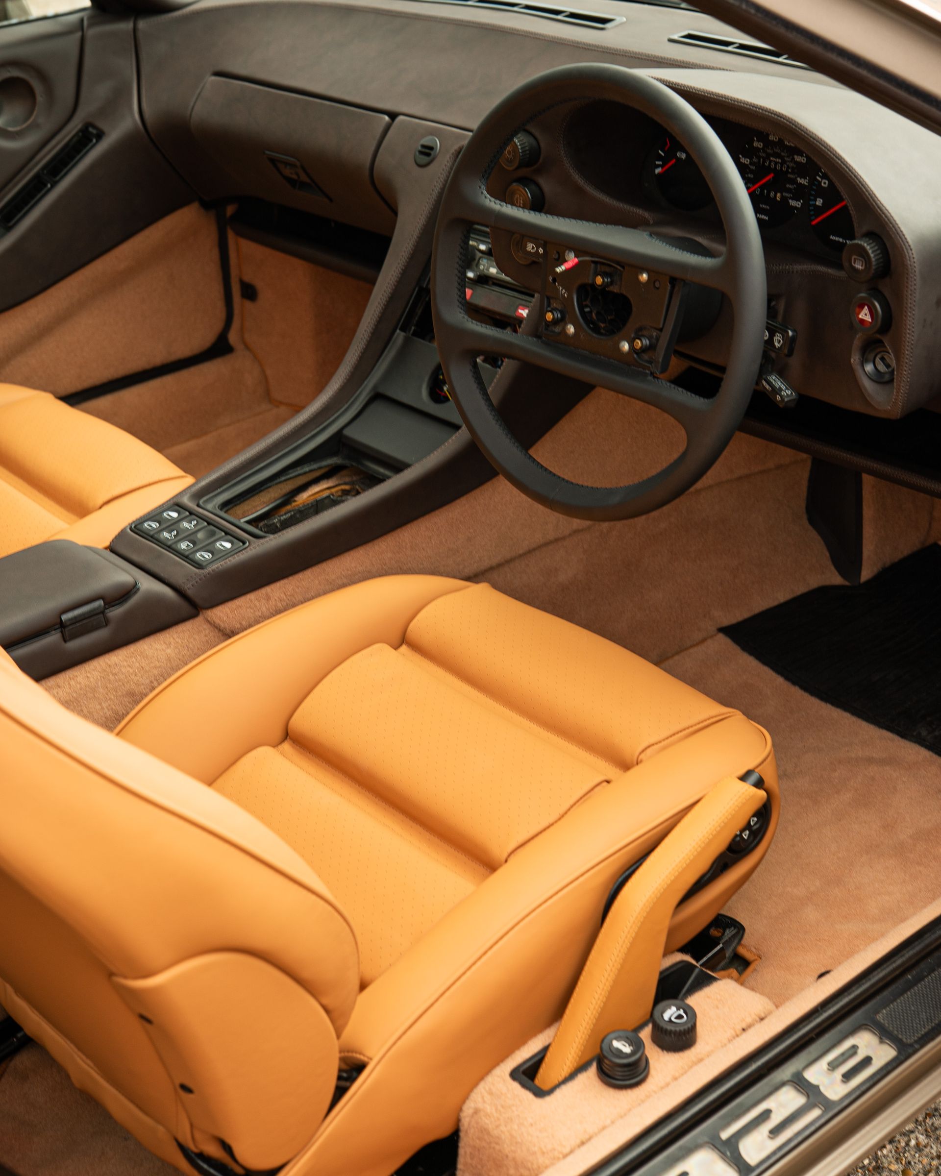 porsche 928 interior retrim leather brown tan cream restomod upholstery reupholstered singer dclass d:class restoration respray