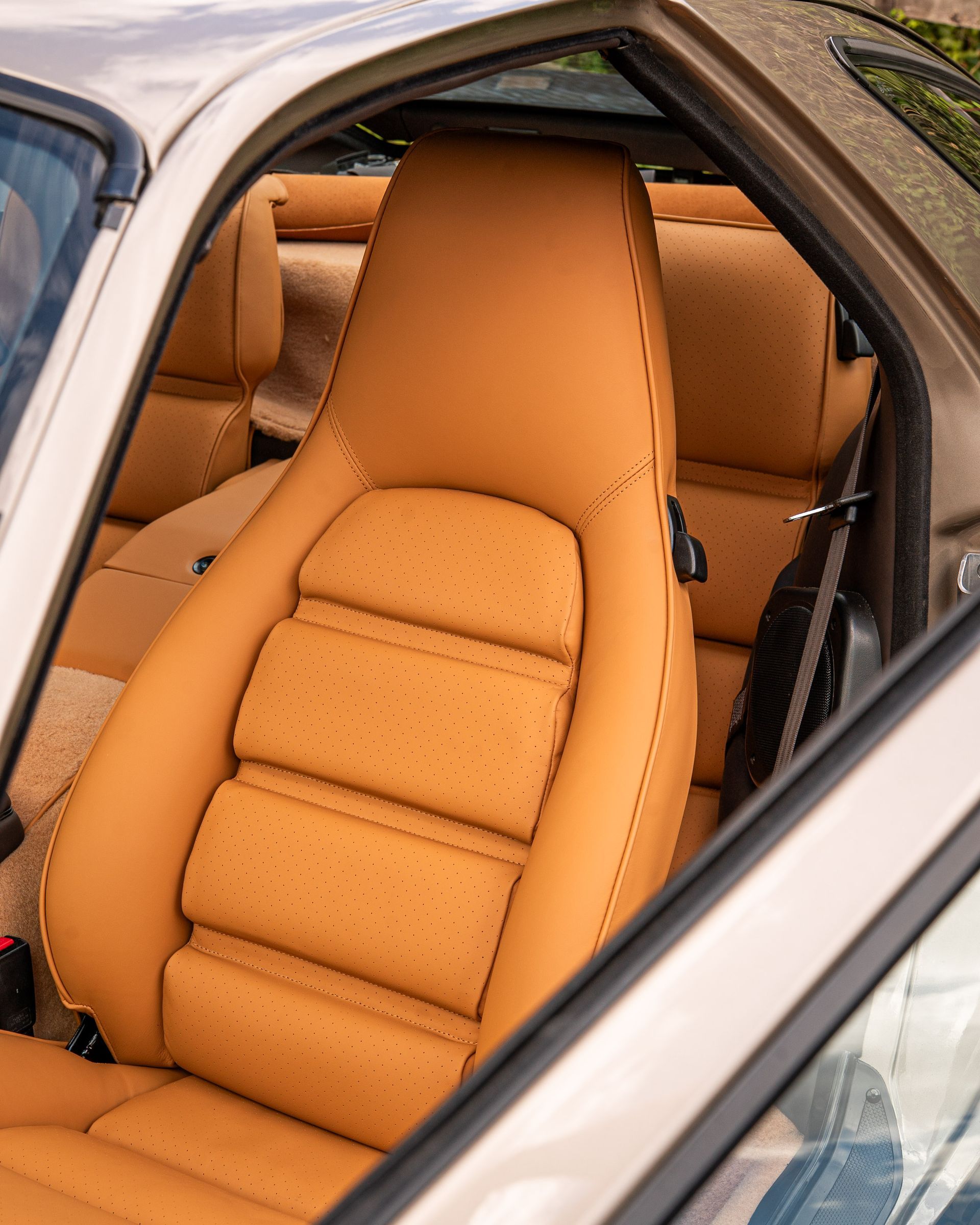 porsche 928 interior retrim leather brown tan cream restomod upholstery reupholstered singer dclass d:class restoration respray