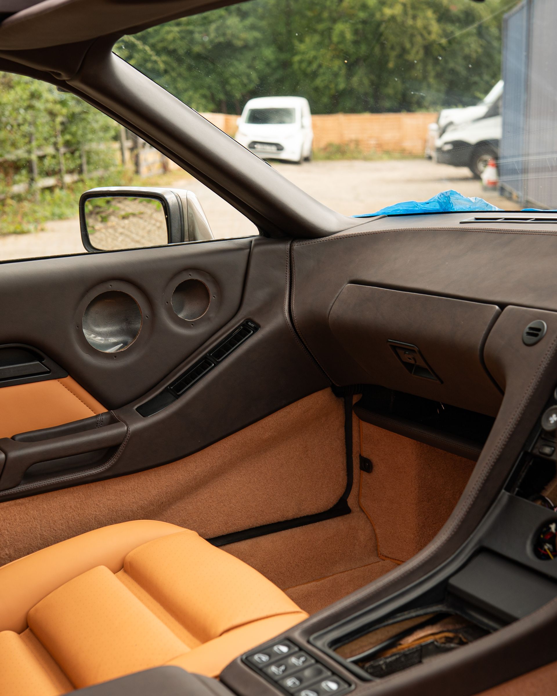 porsche 928 interior retrim leather brown tan cream restomod upholstery reupholstered singer dclass d:class restoration respray