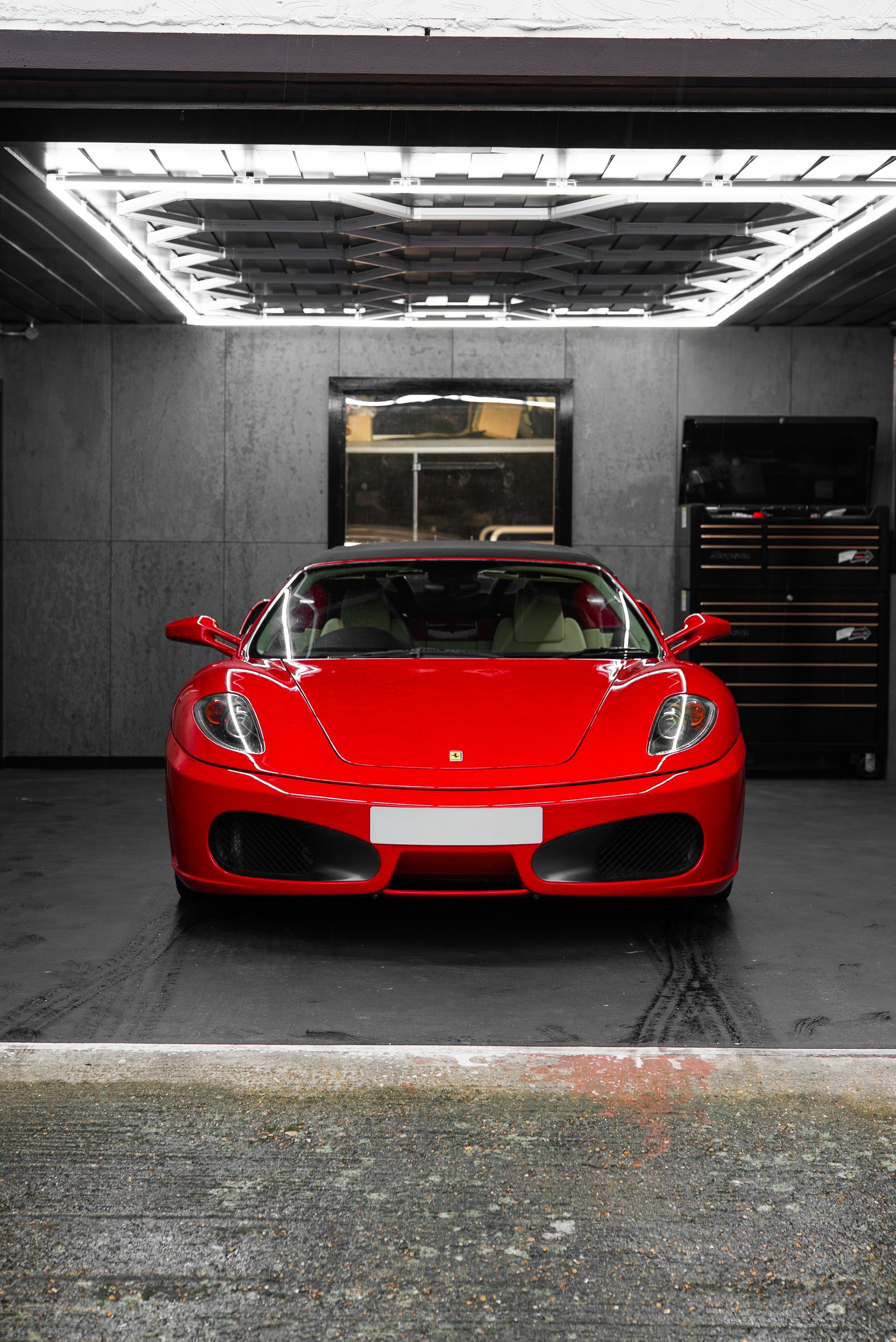 ferrari F430 Spider interior retrim seats doorcards door cards crema nappa leather oem reupholstered stitching thread dashboard steering wheel front view portrait landscape red perforated black cream 