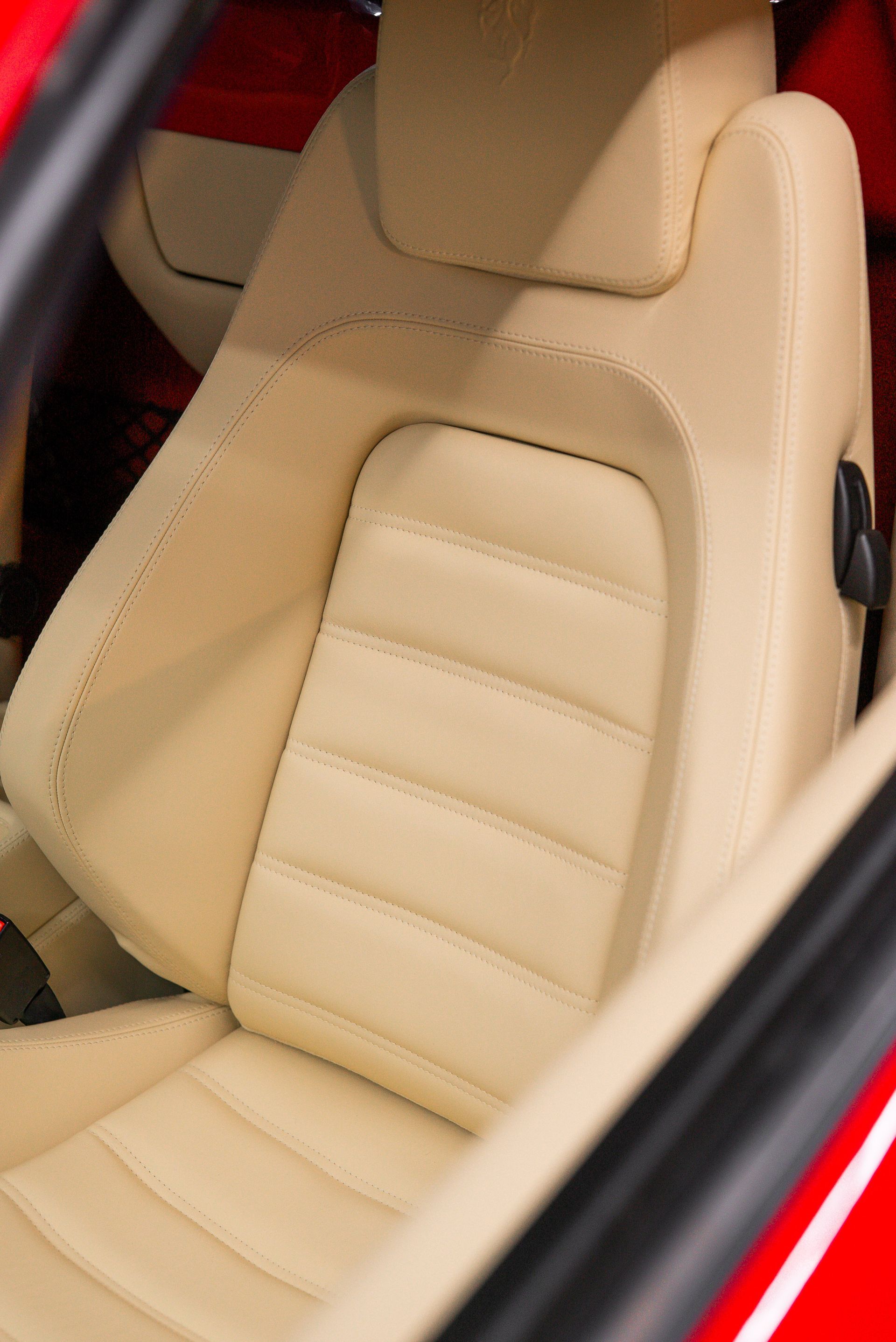 ferrari F430 Spider interior retrim seats doorcards door cards crema nappa leather oem reupholstered stitching thread dashboard steering wheel perforated black cream 
