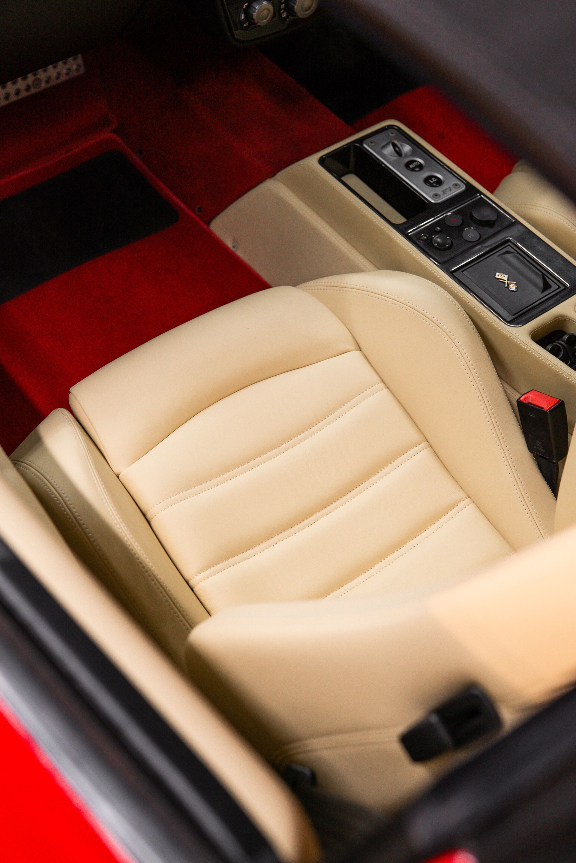 ferrari F430 Spider interior retrim seats doorcards door cards crema nappa leather oem reupholstered stitching thread dashboard steering wheel perforated black cream 