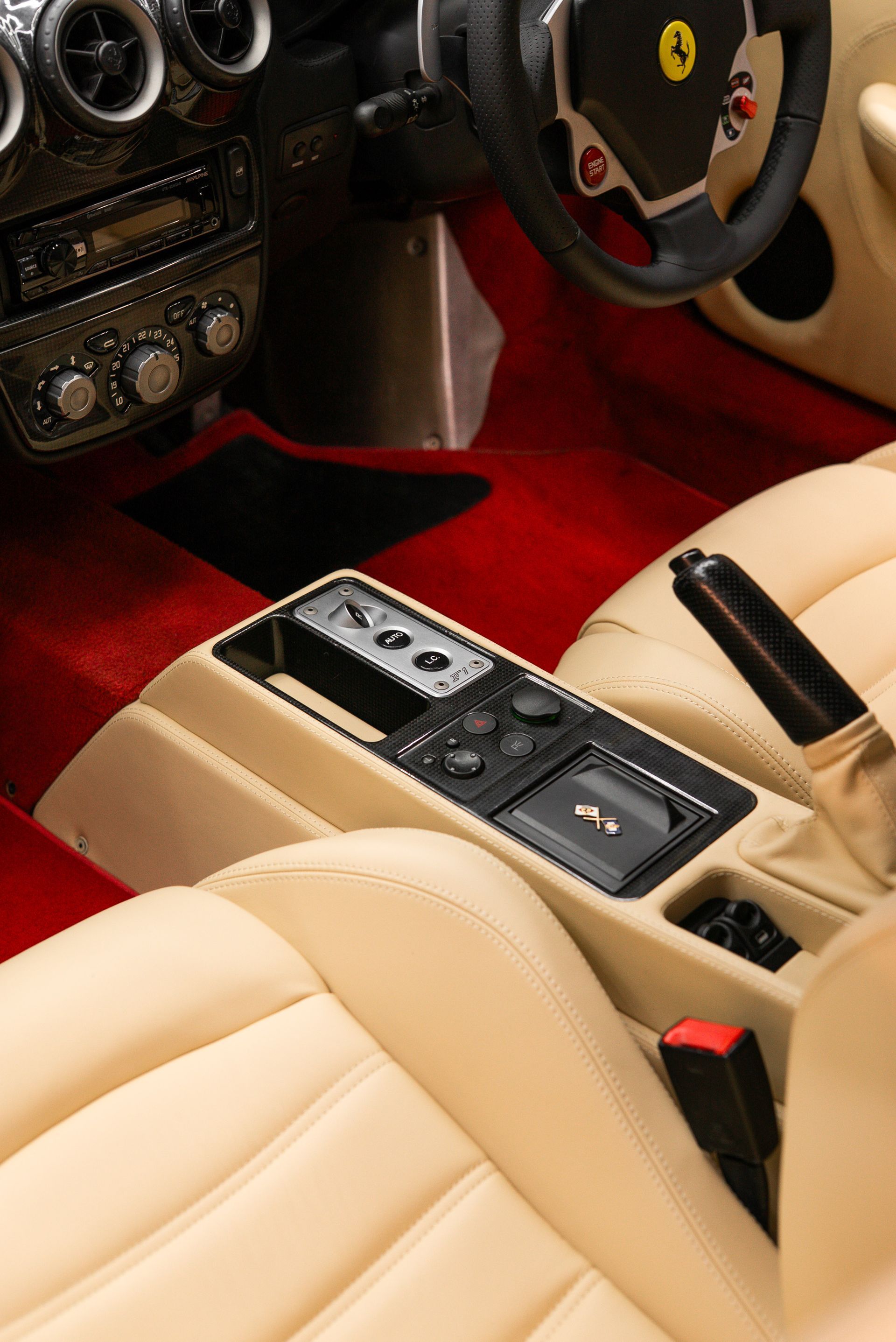 ferrari F430 Spider interior retrim seats doorcards door cards crema nappa leather oem reupholstered stitching thread dashboard steering wheel perforated black cream 