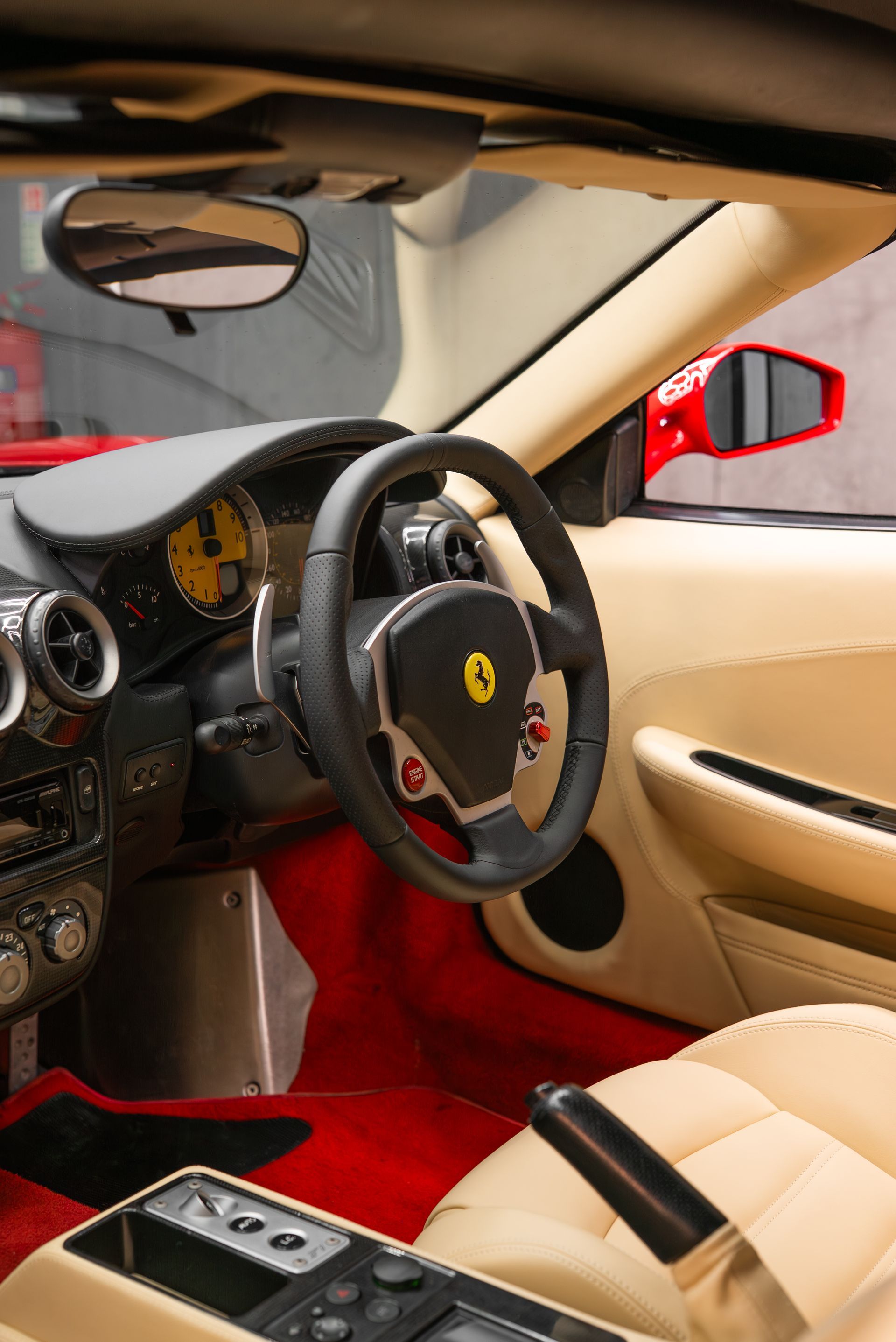 ferrari F430 Spider interior retrim seats doorcards door cards crema nappa leather oem reupholstered stitching thread dashboard steering wheel perforated black cream 