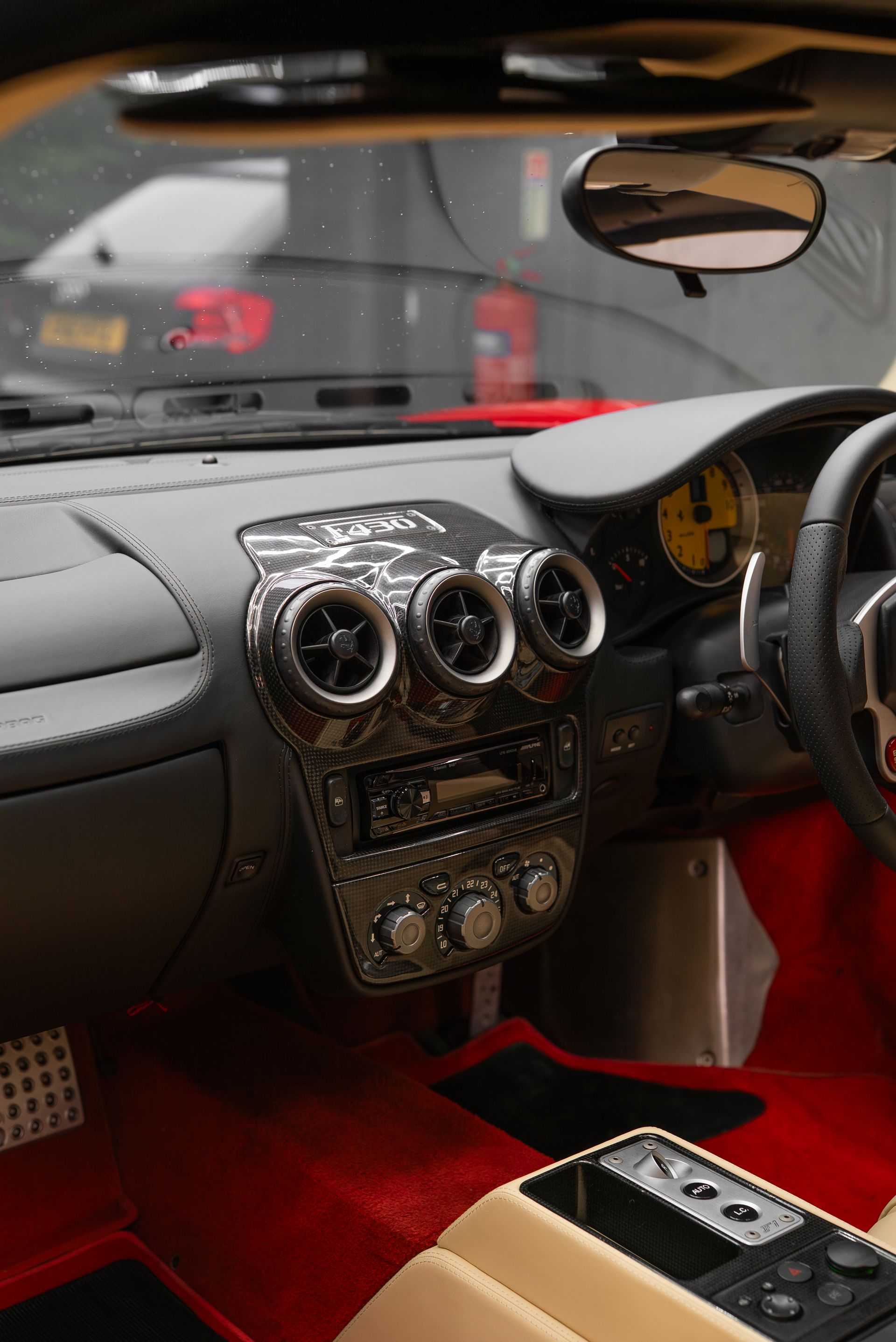 ferrari F430 Spider interior retrim seats doorcards door cards crema nappa leather oem reupholstered stitching thread dashboard steering wheel perforated black cream 