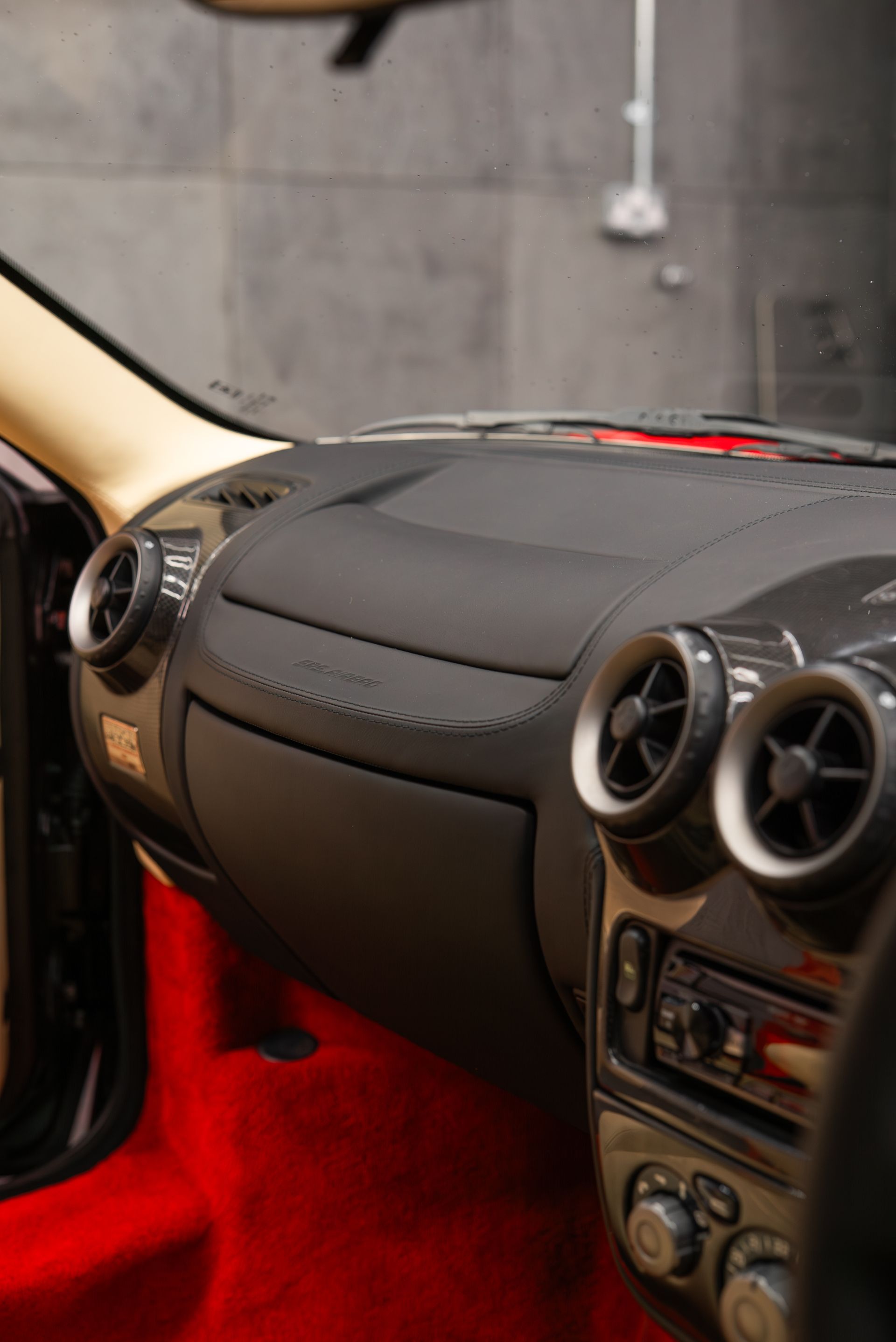 ferrari F430 Spider interior retrim seats doorcards door cards crema nappa leather oem reupholstered stitching thread dashboard steering wheel perforated black cream 