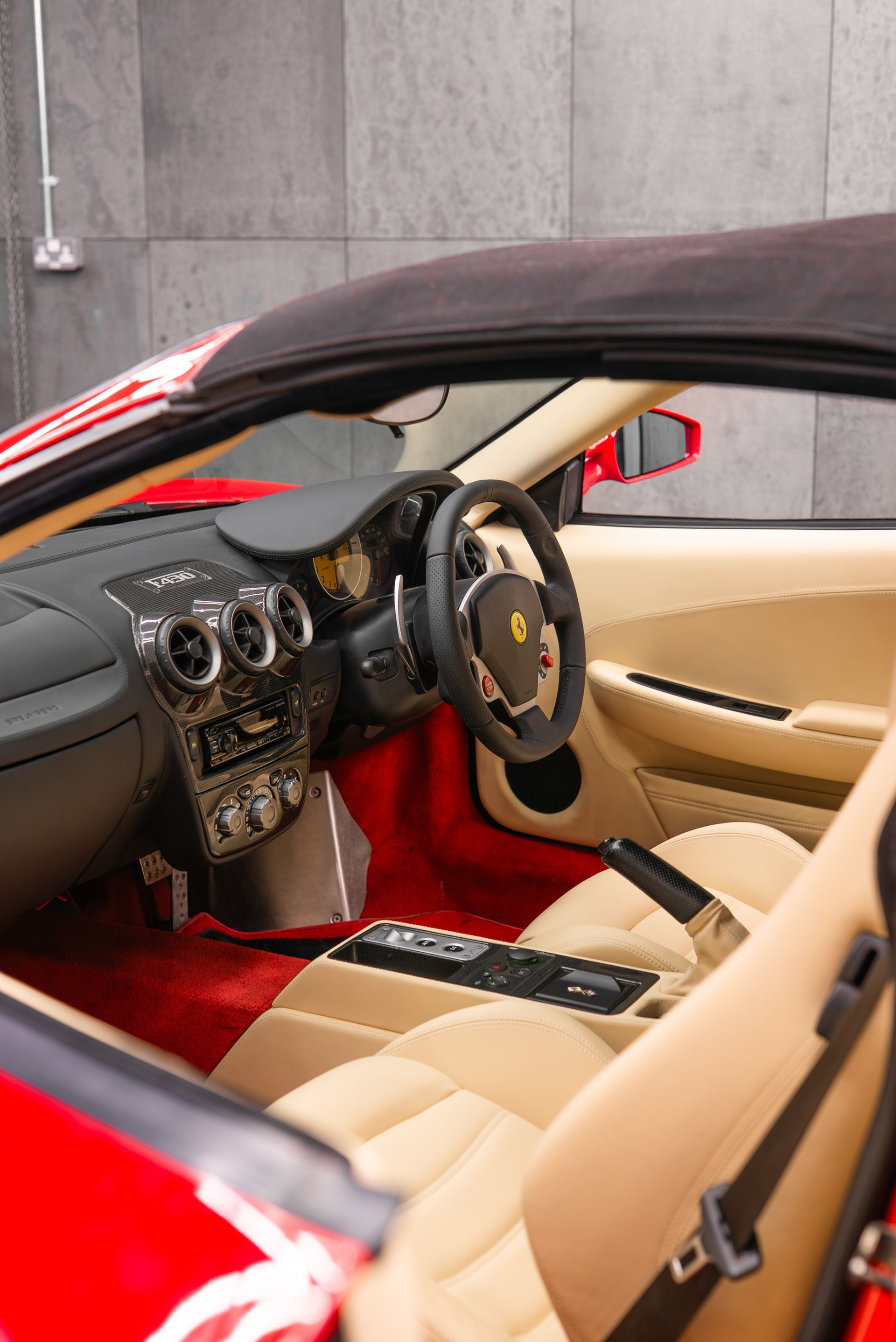 ferrari F430 Spider interior retrim seats doorcards door cards crema nappa leather oem reupholstered stitching thread dashboard steering wheel perforated black cream 