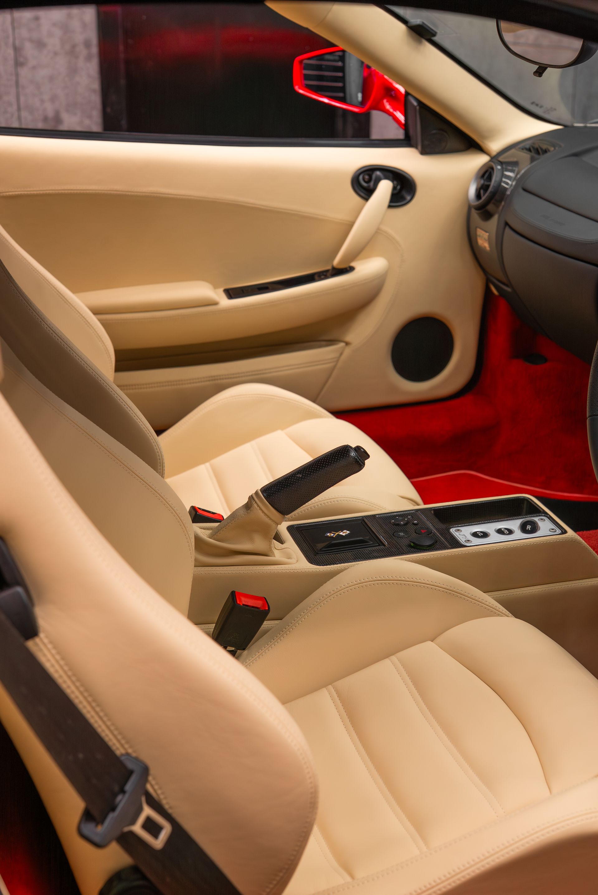 ferrari F430 Spider interior retrim seats doorcards door cards crema nappa leather oem reupholstered stitching thread dashboard steering wheel perforated black cream 