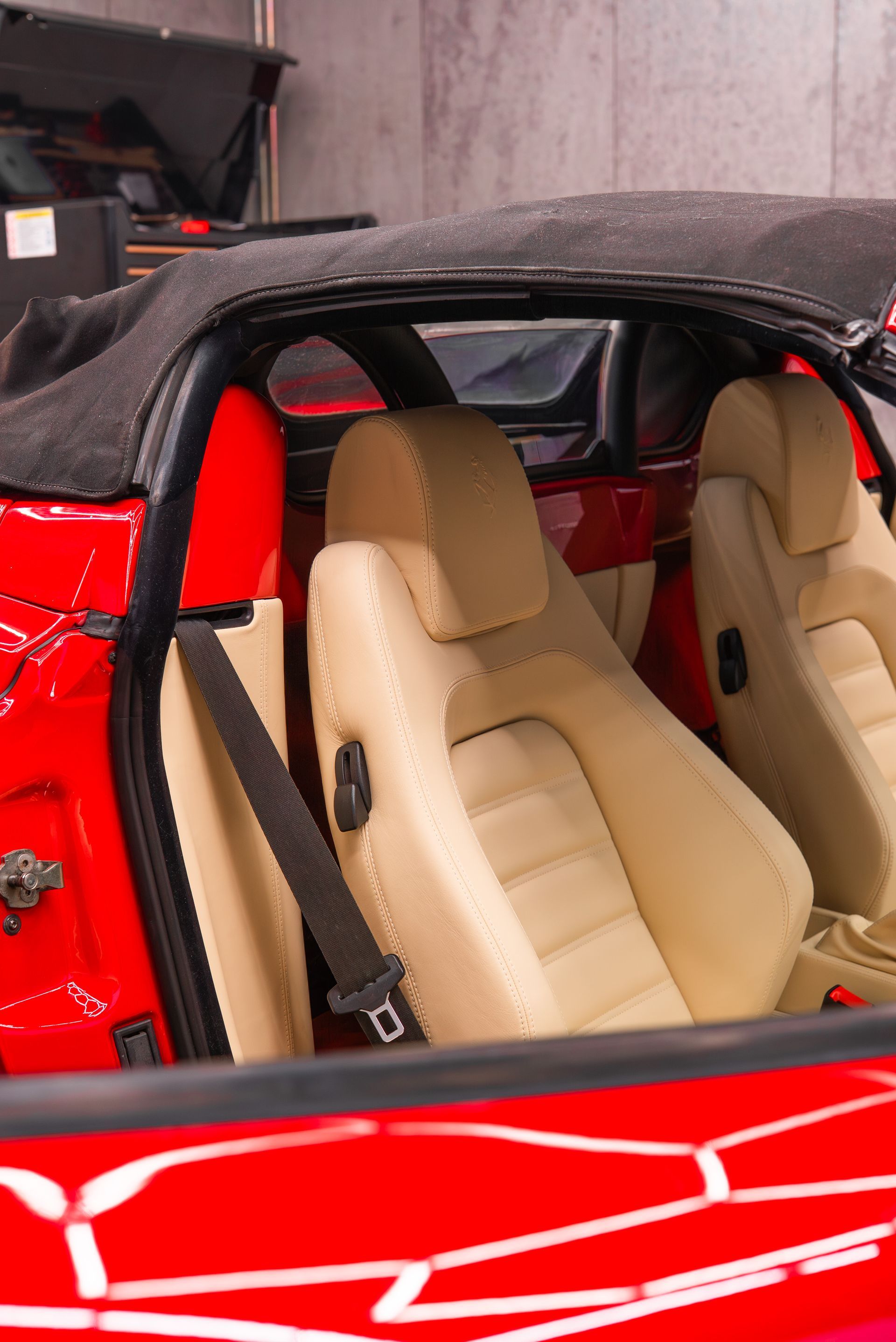 ferrari F430 Spider interior retrim seats doorcards door cards crema nappa leather oem reupholstered stitching thread dashboard steering wheel perforated black cream 