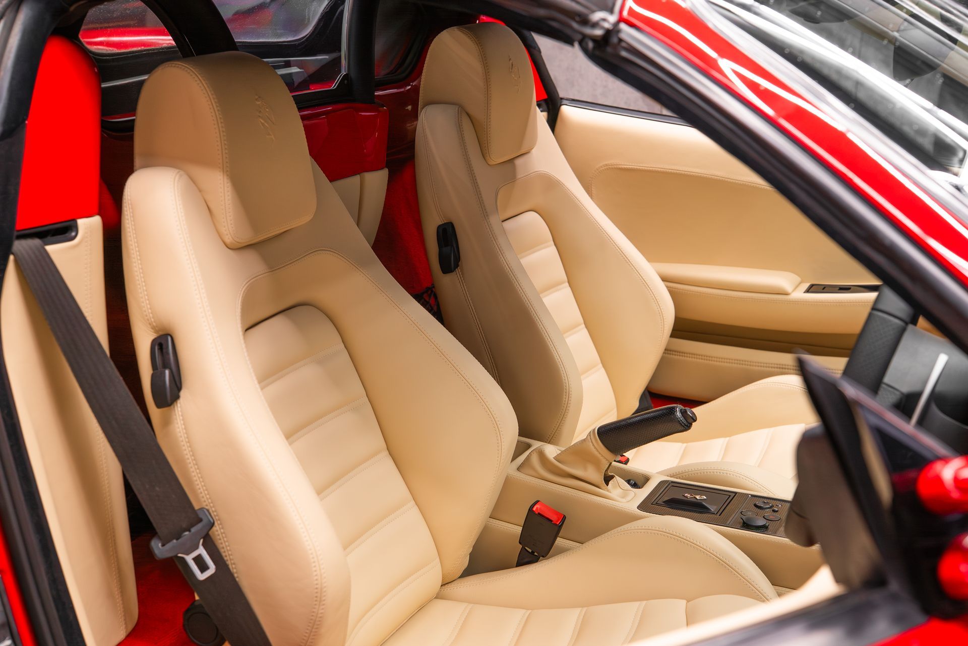 ferrari F430 Spider interior retrim seats doorcards door cards crema nappa leather oem reupholstered stitching thread dashboard steering wheel perforated black cream 