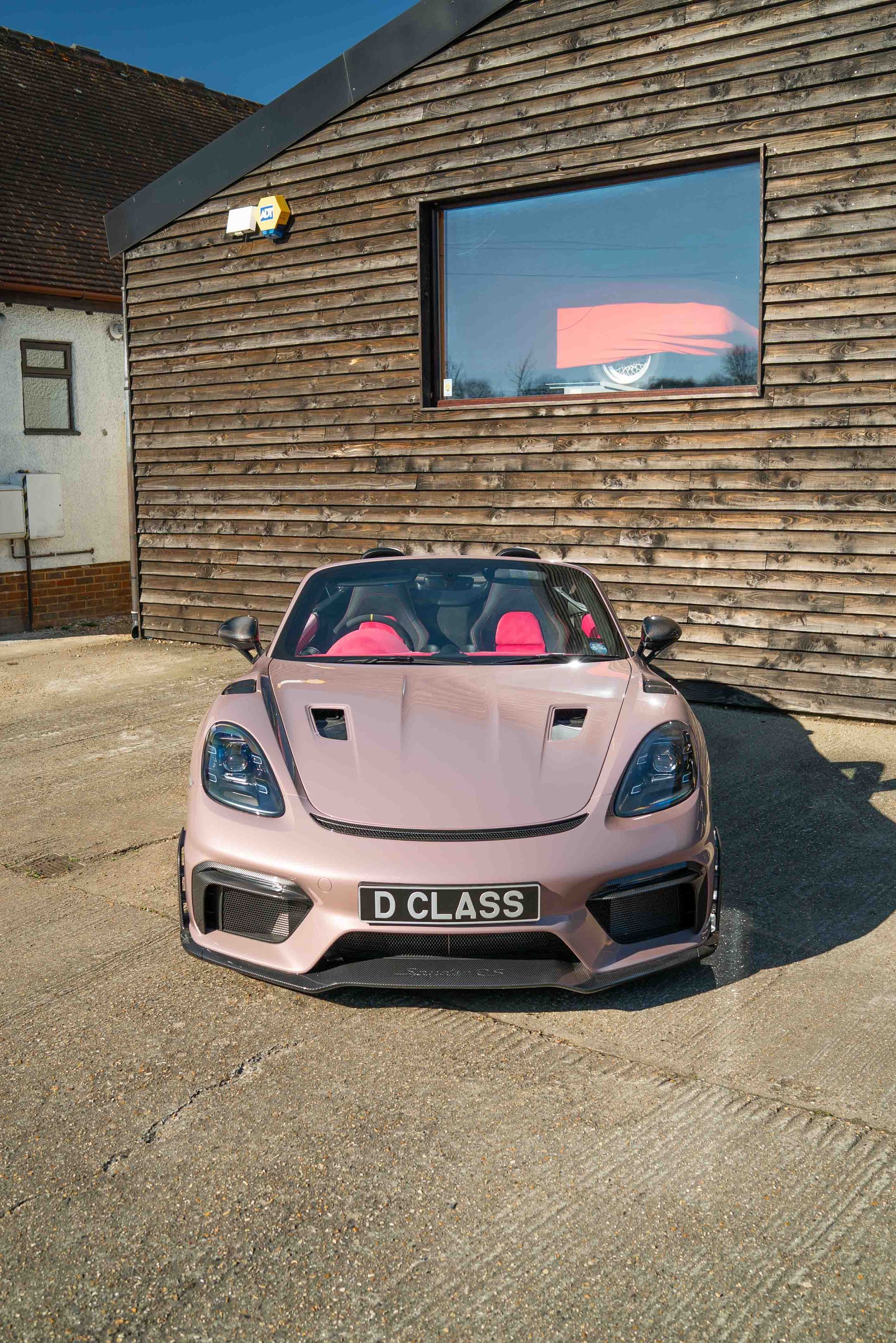 porsche spyder RS 718 interior retrim customisation custom customised pink alcantara dashboard seats frozen berry