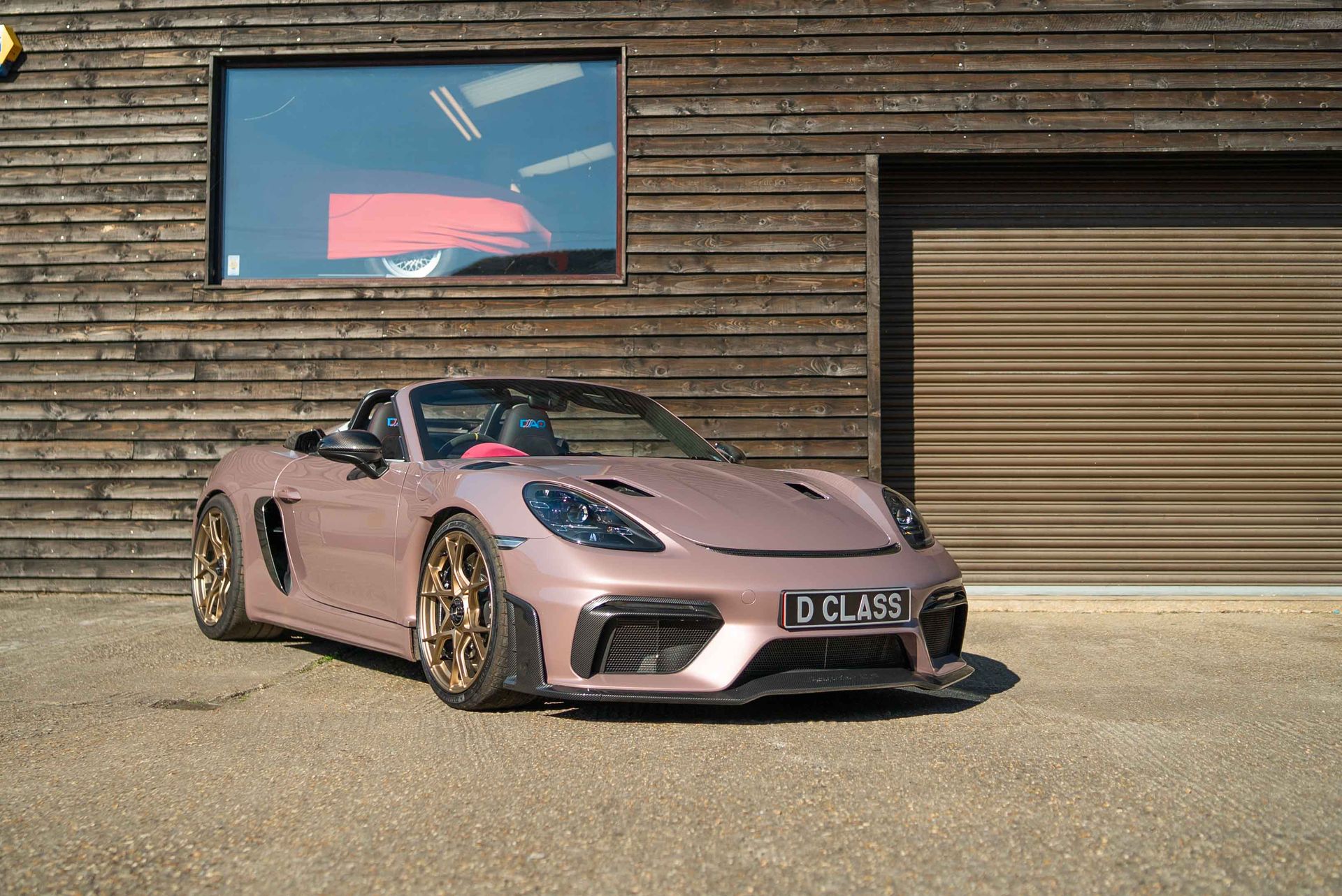 Porsche 718 cayman spyder rs pink frozen berry retrim alcantara weissach seats dashboard d:class 