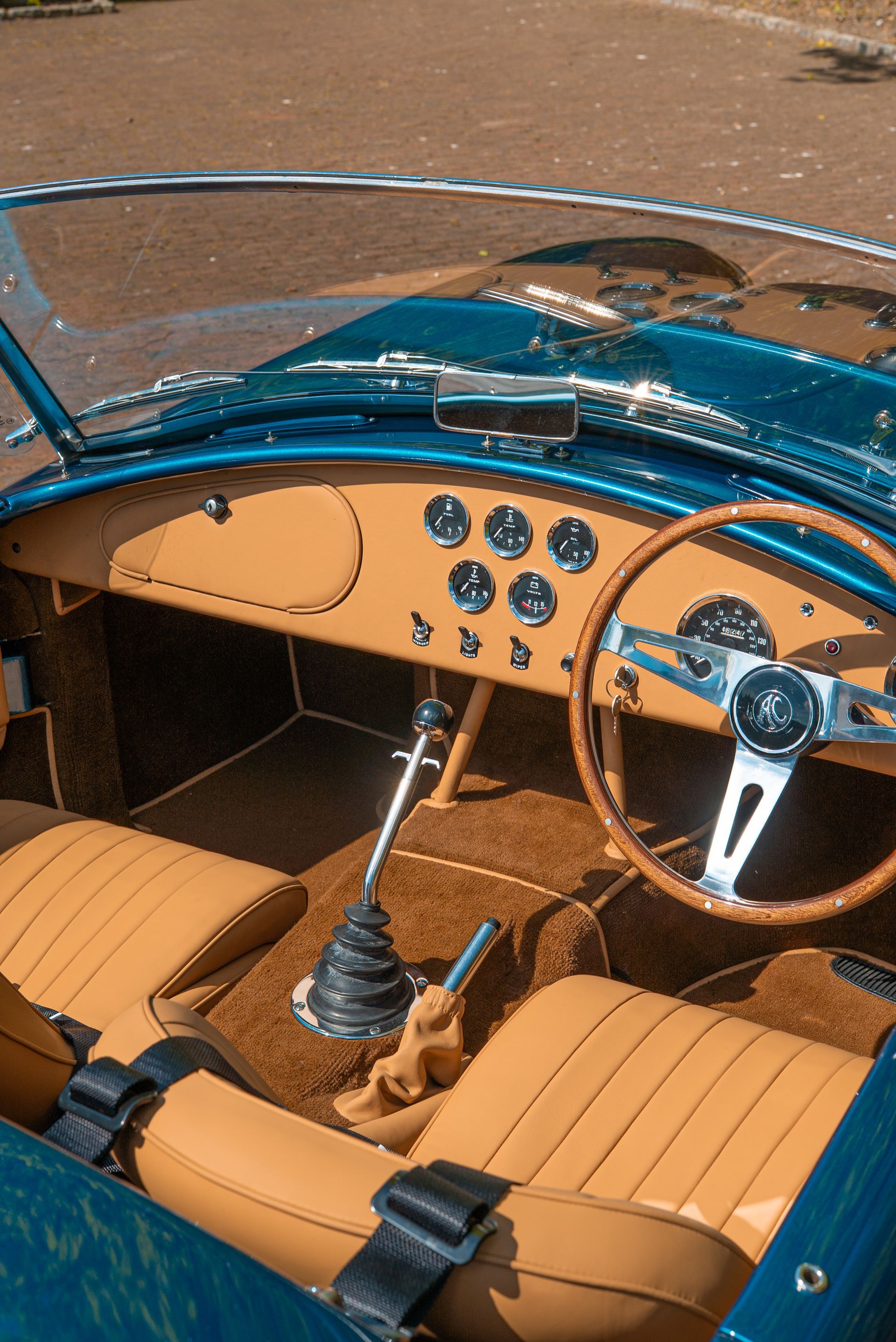 AC Cobra mkiv mk iv mk4 restoration tan leather interior guards blue metallic redline engineering d:class automotive dclass upholstery retrim