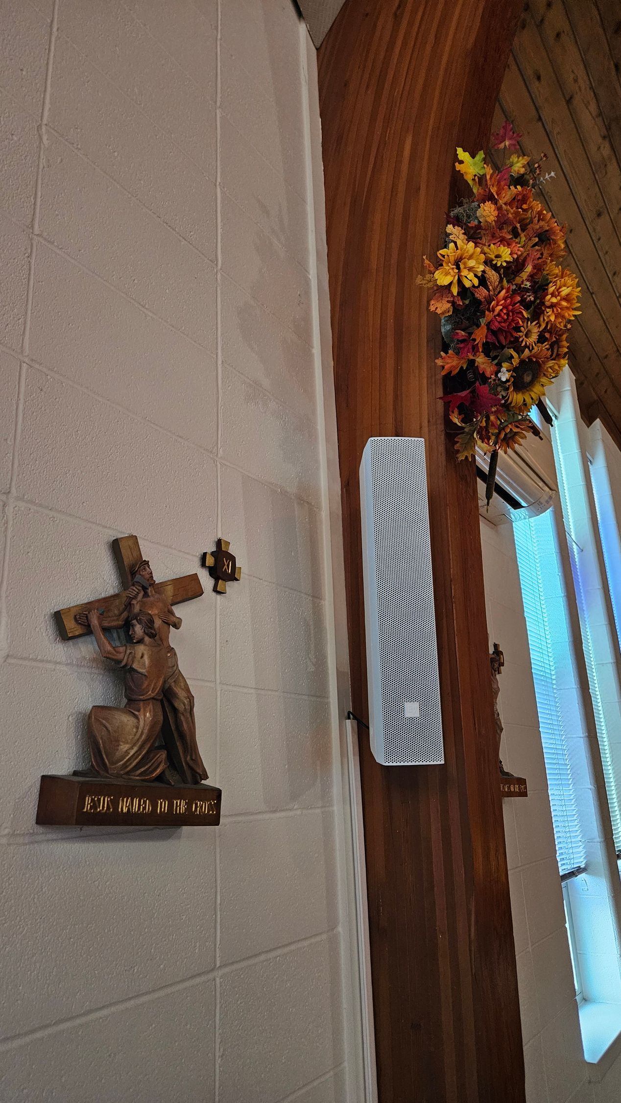 An Audio speaker installed by fisher custom av for house of worship audio.
