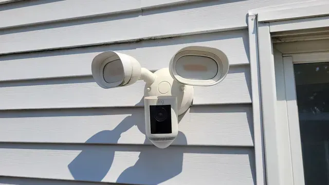 White floodlight security camera installed by fisher custom av in huron ohio