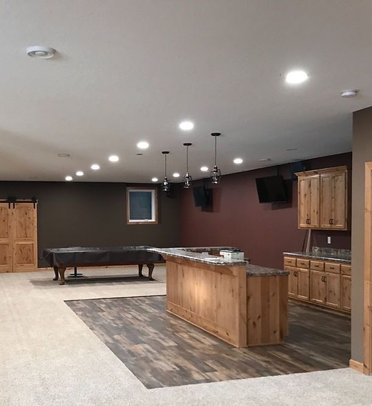 Spacious game room with pool table, bar island, cabinets, and recessed ceiling lights