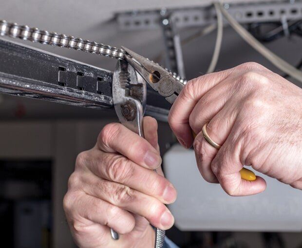 Tools Use to Repair Garage Door Chain — Garage Door Maintenance in Gold Coast