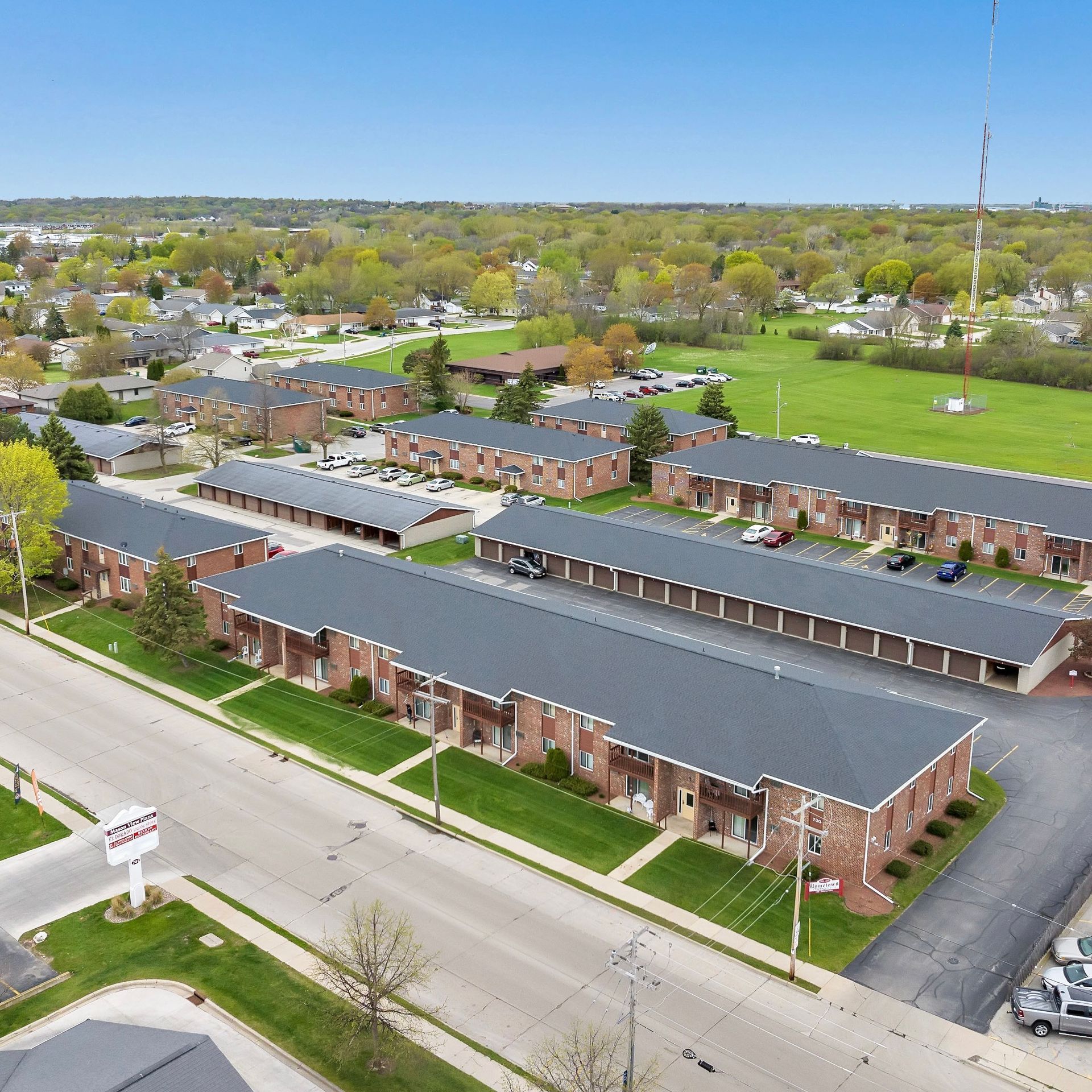An aerial view of a row of apartment buildings