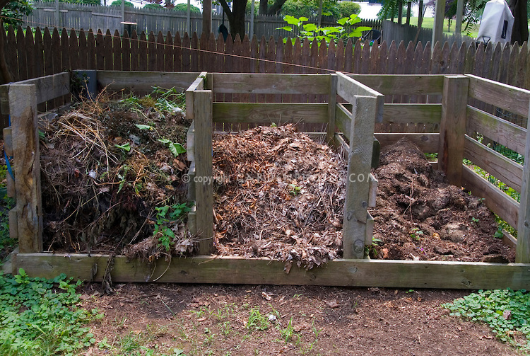 Three compost bins side-by-side
