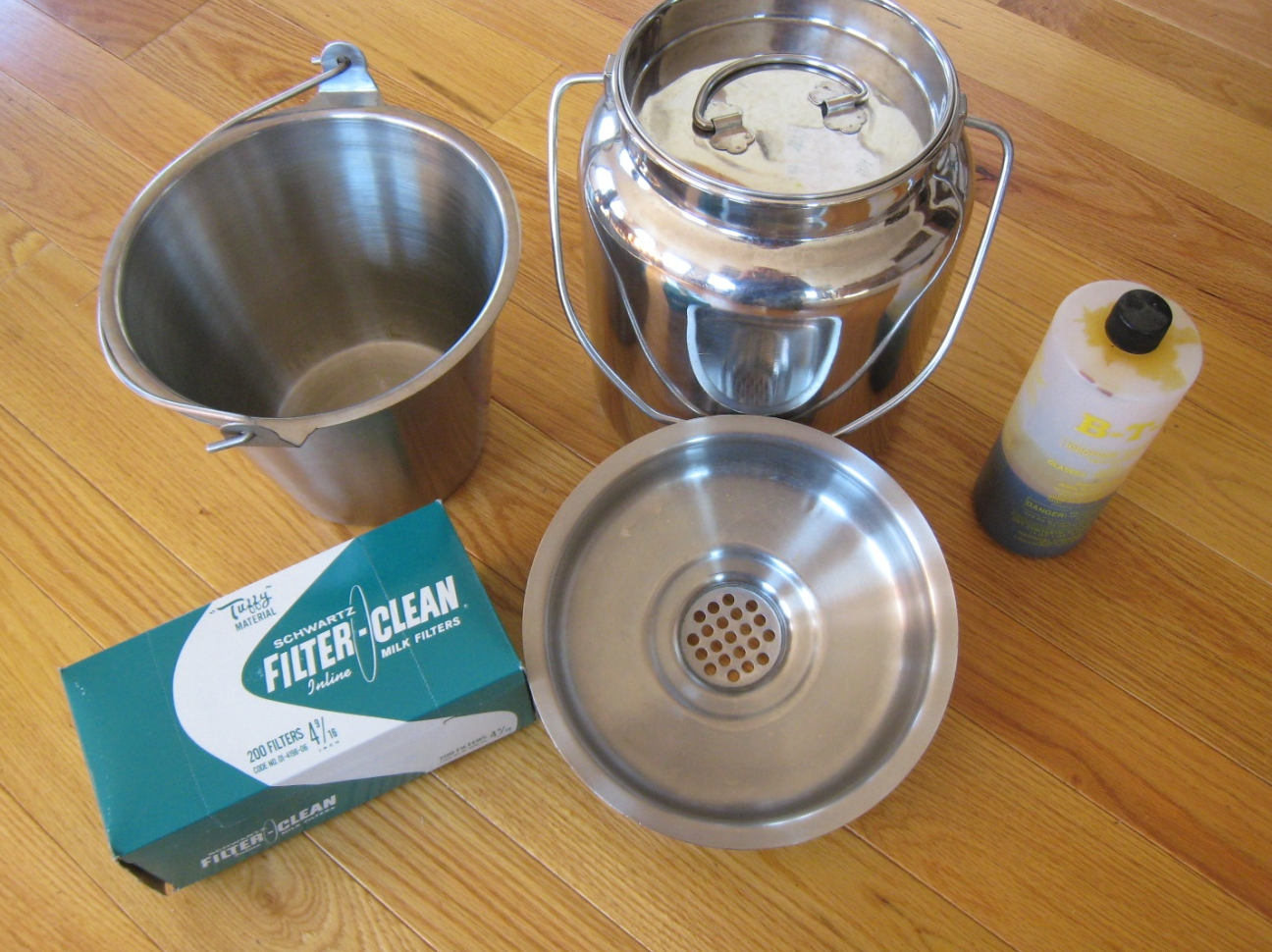 Stainless steel milking equipment including bucket, filters, iodine and ten liter container