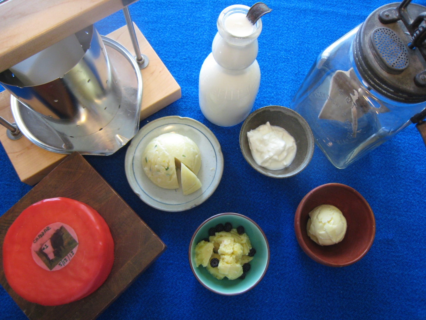 milk products including cheeses, raw milk and equipment including cheese press and butter churn