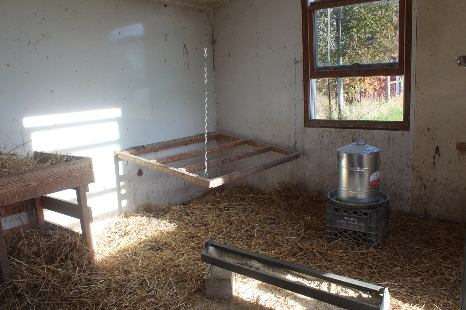 roost in turkey house folds up against wall for cleaning