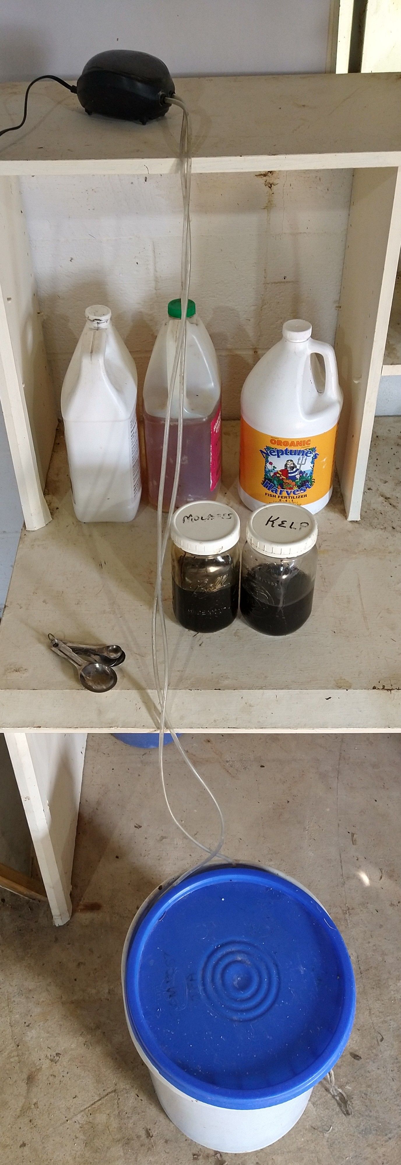 Photo of my compost tea set-up including how to keep the pump higher than the tea