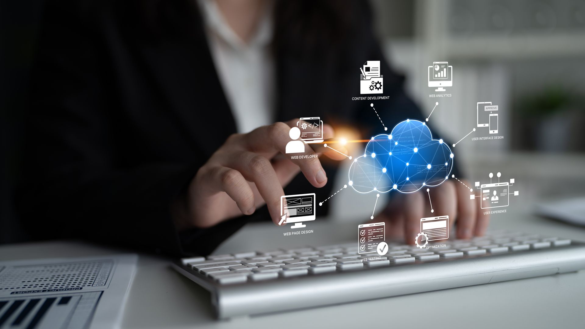 Businessperson using a laptop with glowing digital network icons floating above the keyboard