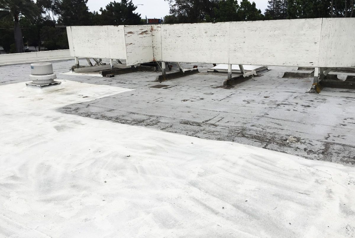A roof with a lot of white paint on it