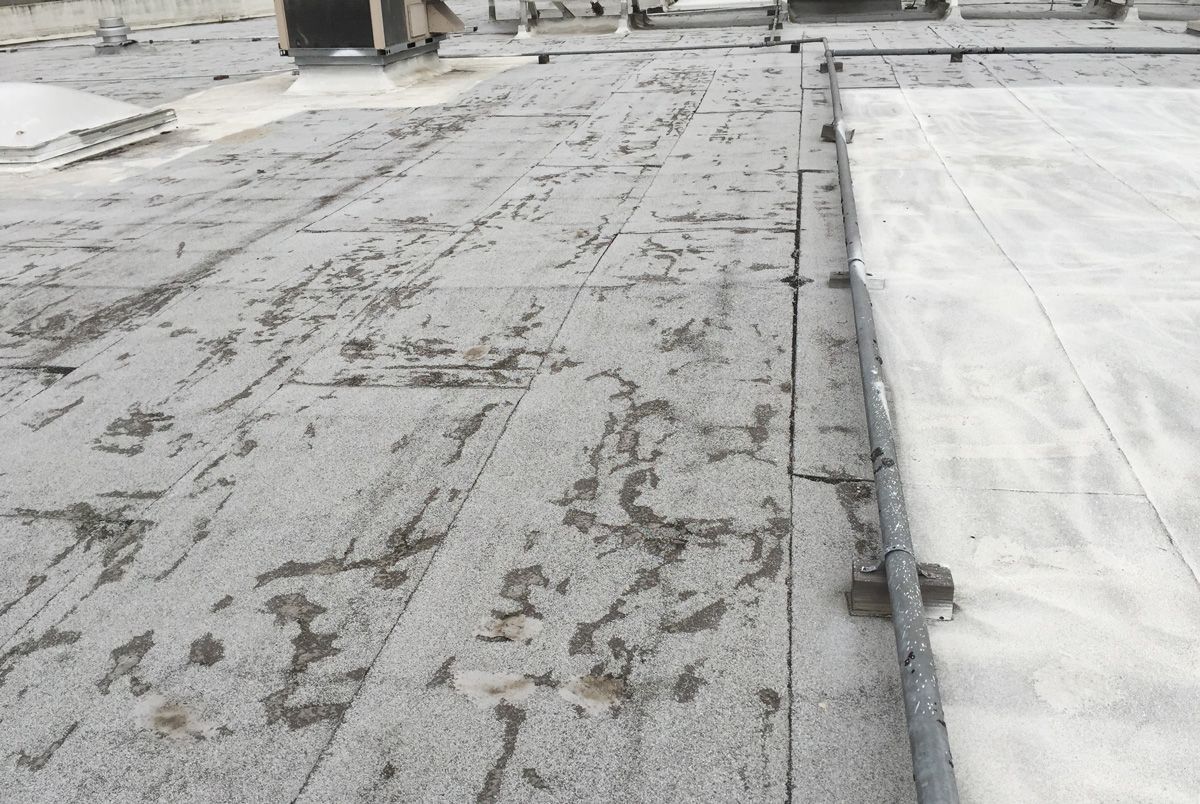 A roof with a lot of stains on it